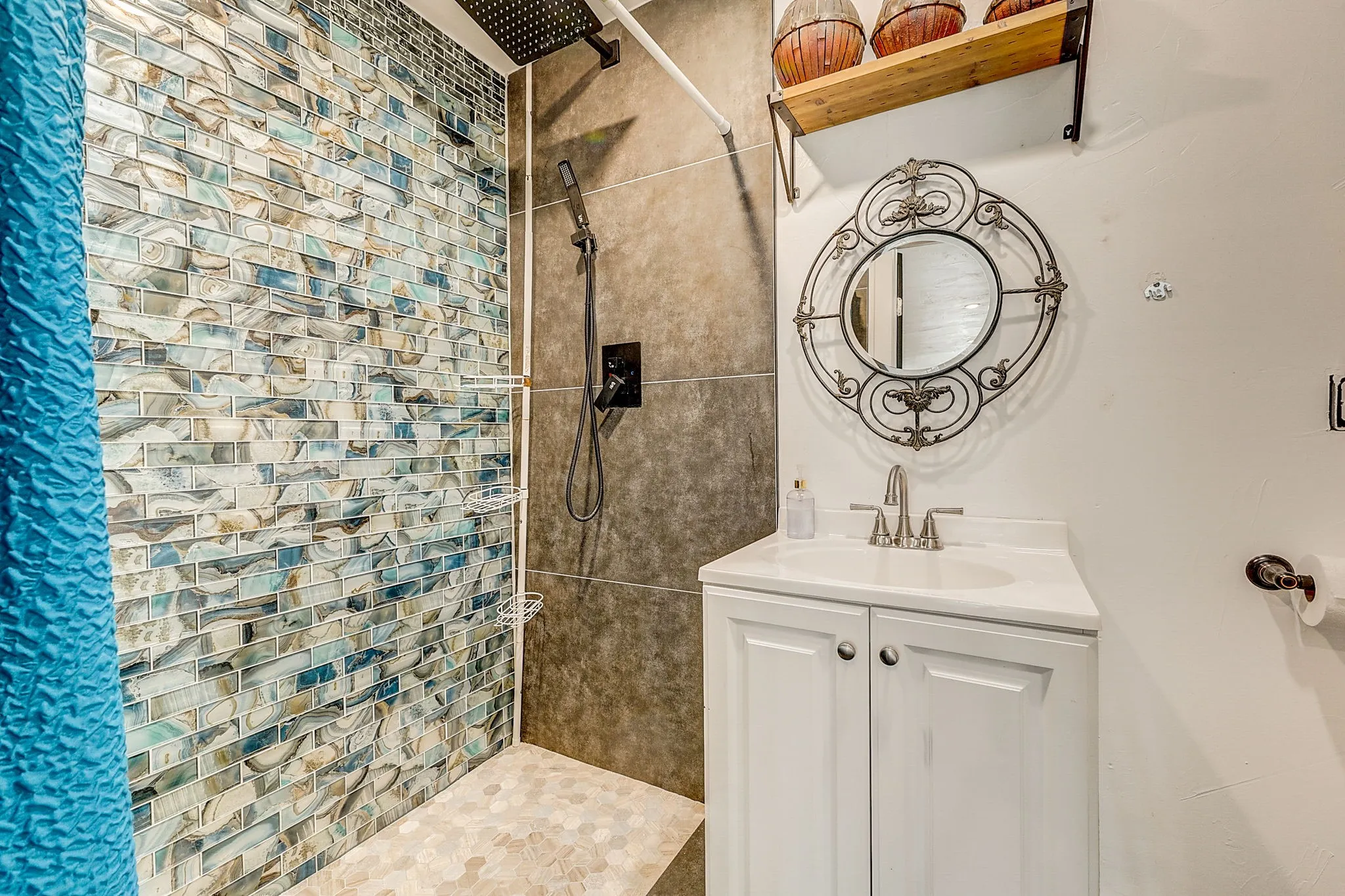 Extra Full bathroom Bathroom with vanity and a designer tile shower