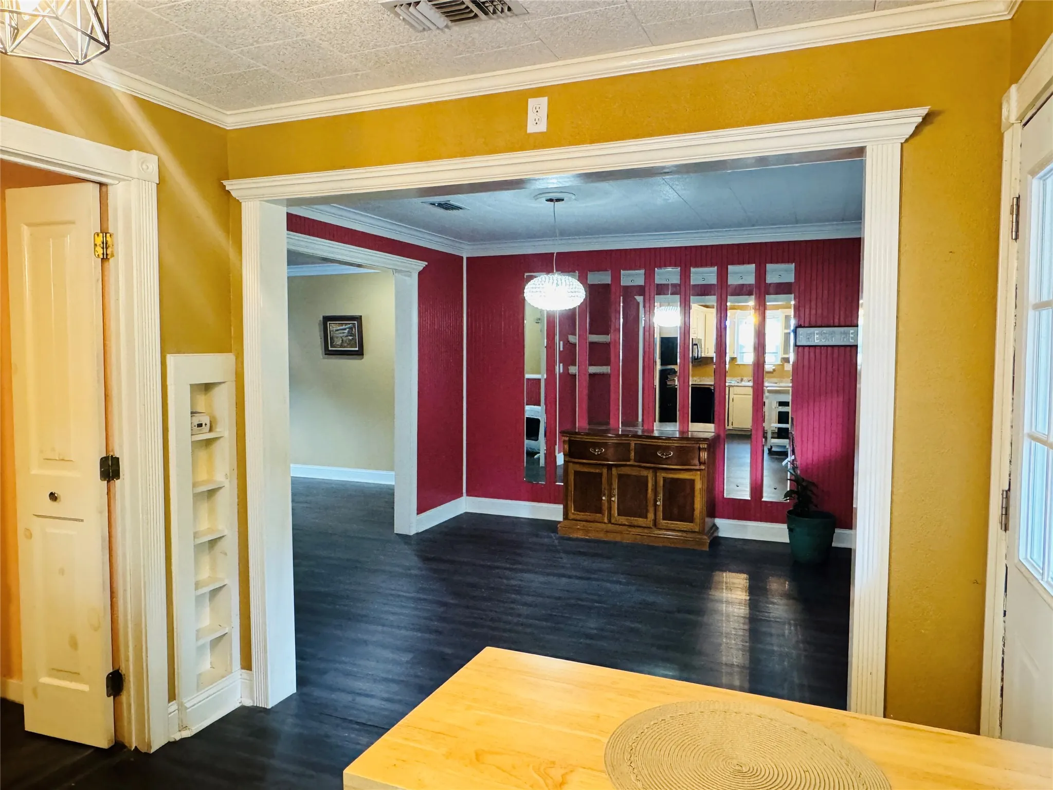 Kitchen area with access to laundry room/pantry, and back yard