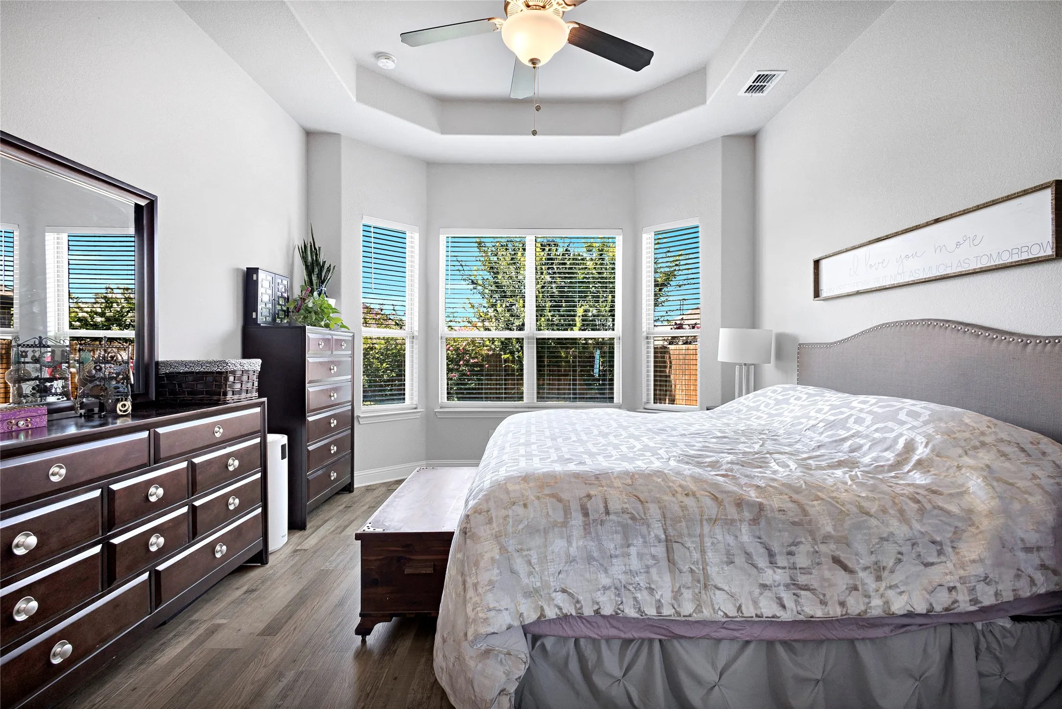 Recessed ceiling with a multi-paneled bay window