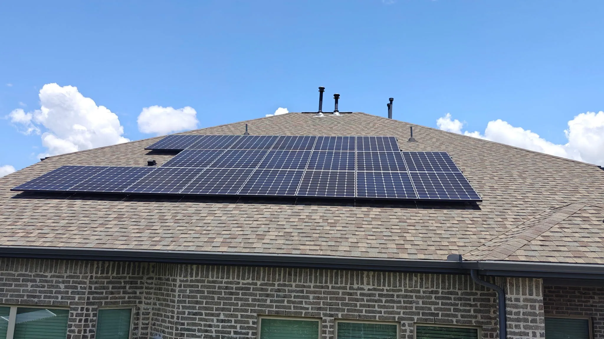 Roof-mounted solar panels providing energy efficiency