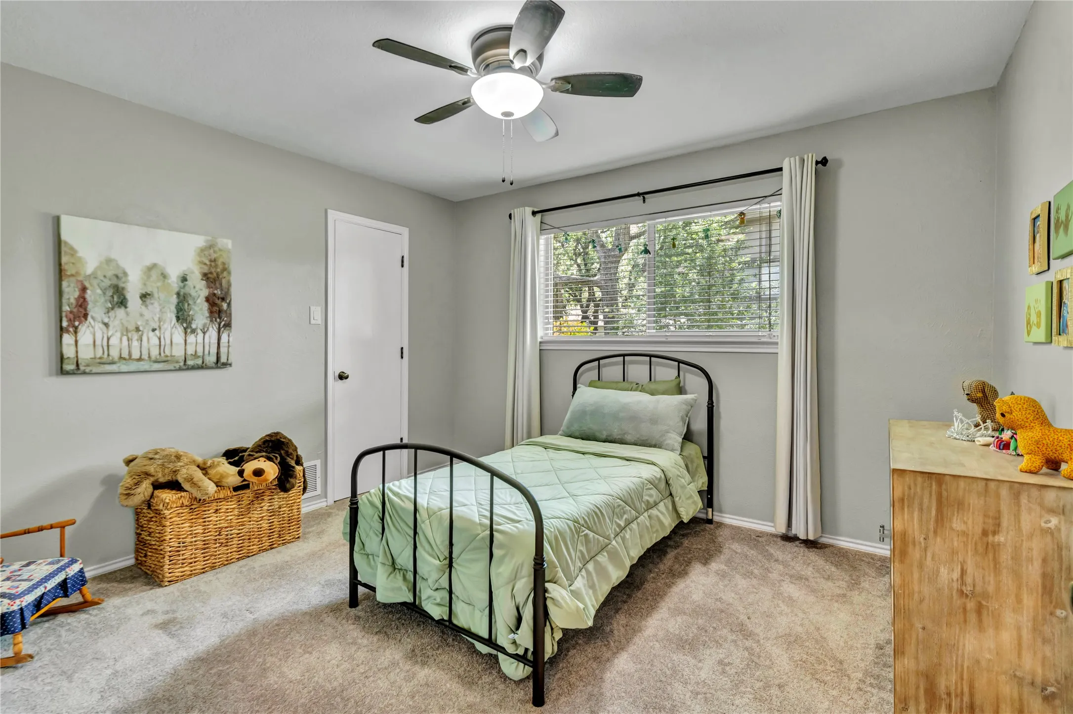 Guest room located near the primary bedroom
