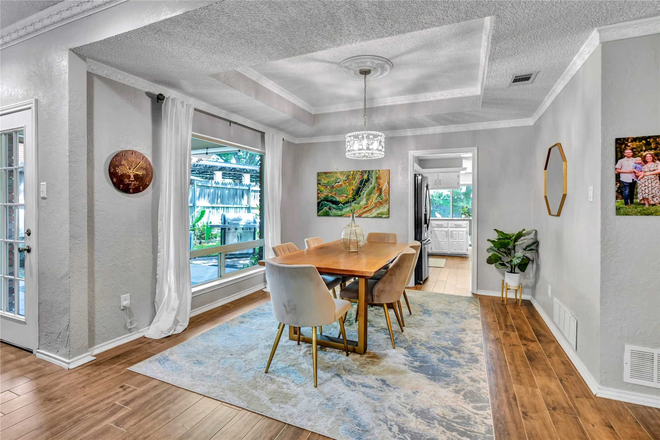 Beautiful dining area, with gorgeous new windows overlooking the patio