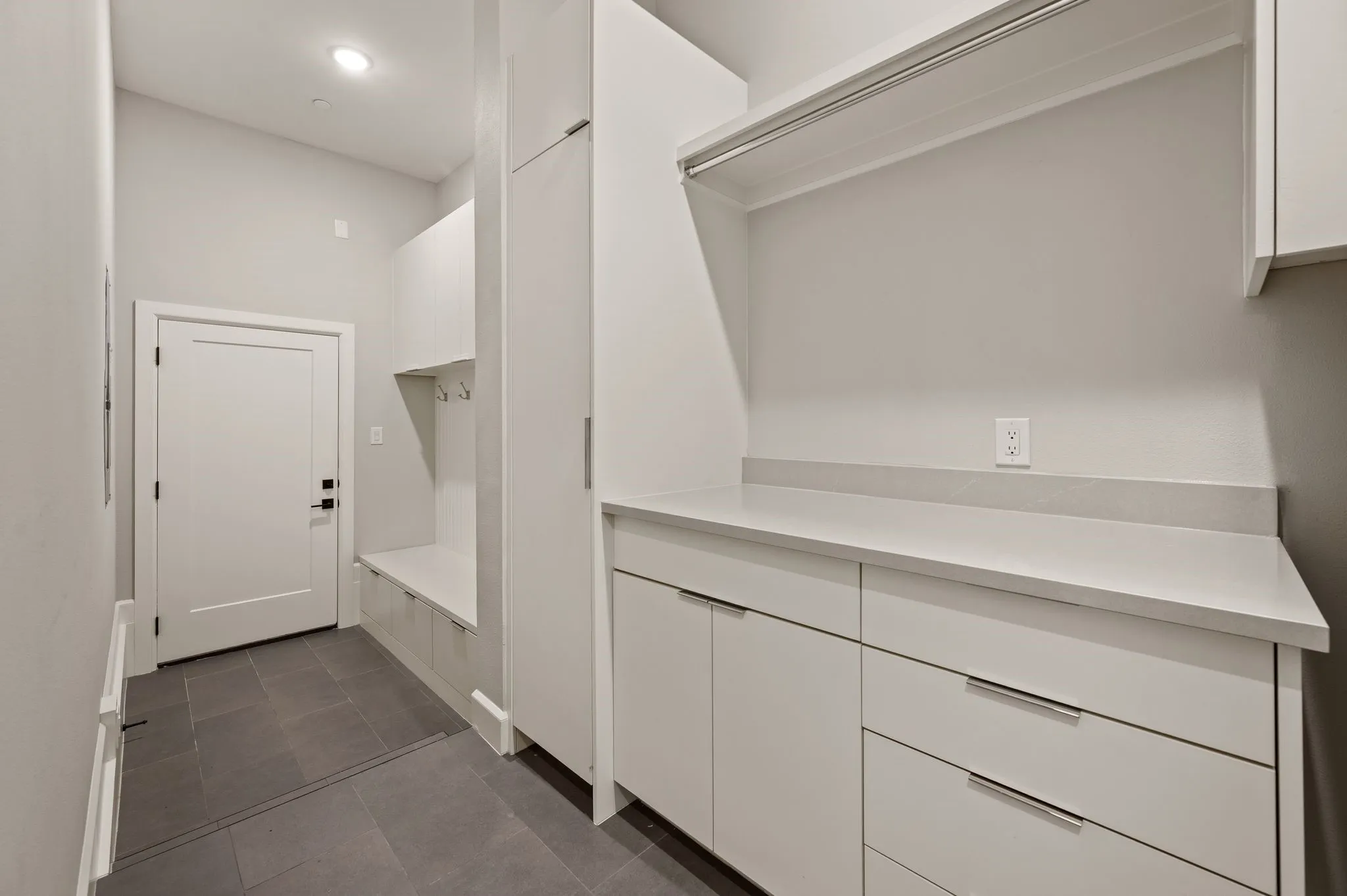 Mudroom/Utility with access to private garage.
