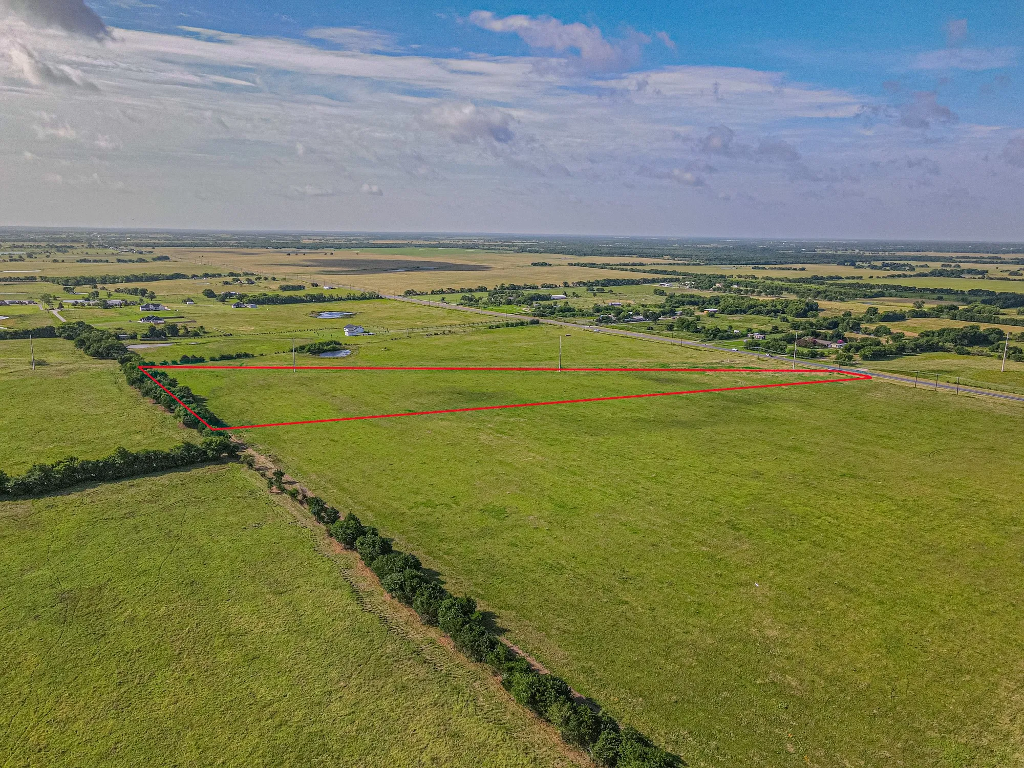 Expansive green acreage with clearly delineated boundaries
