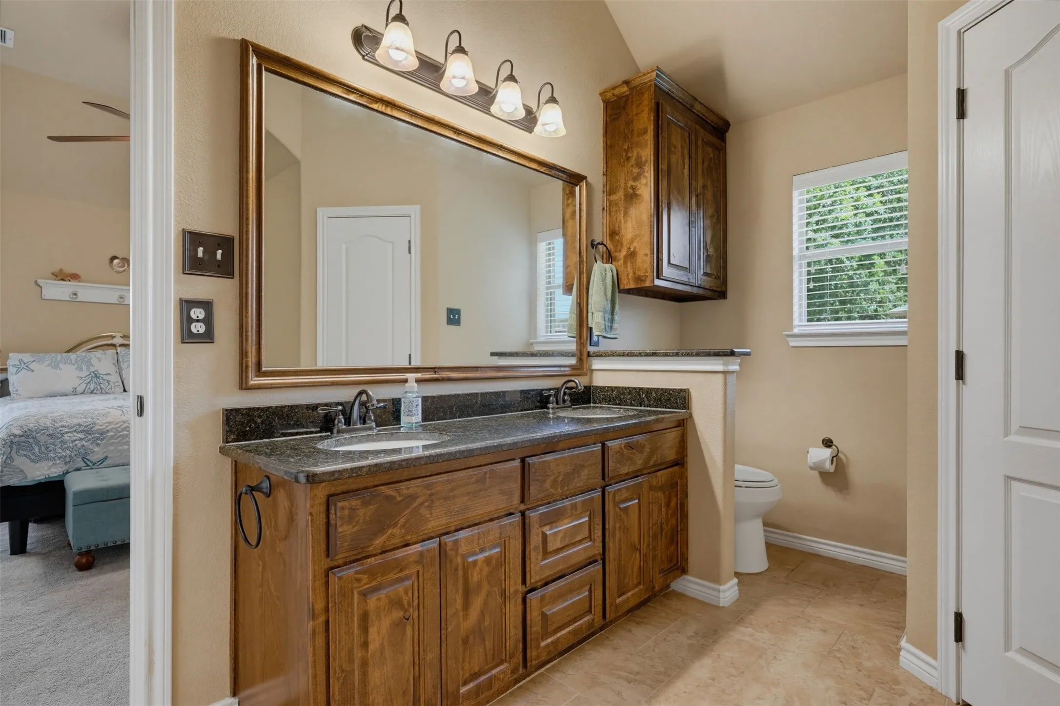 Primary Bathroom with granite countertop & duel sinks