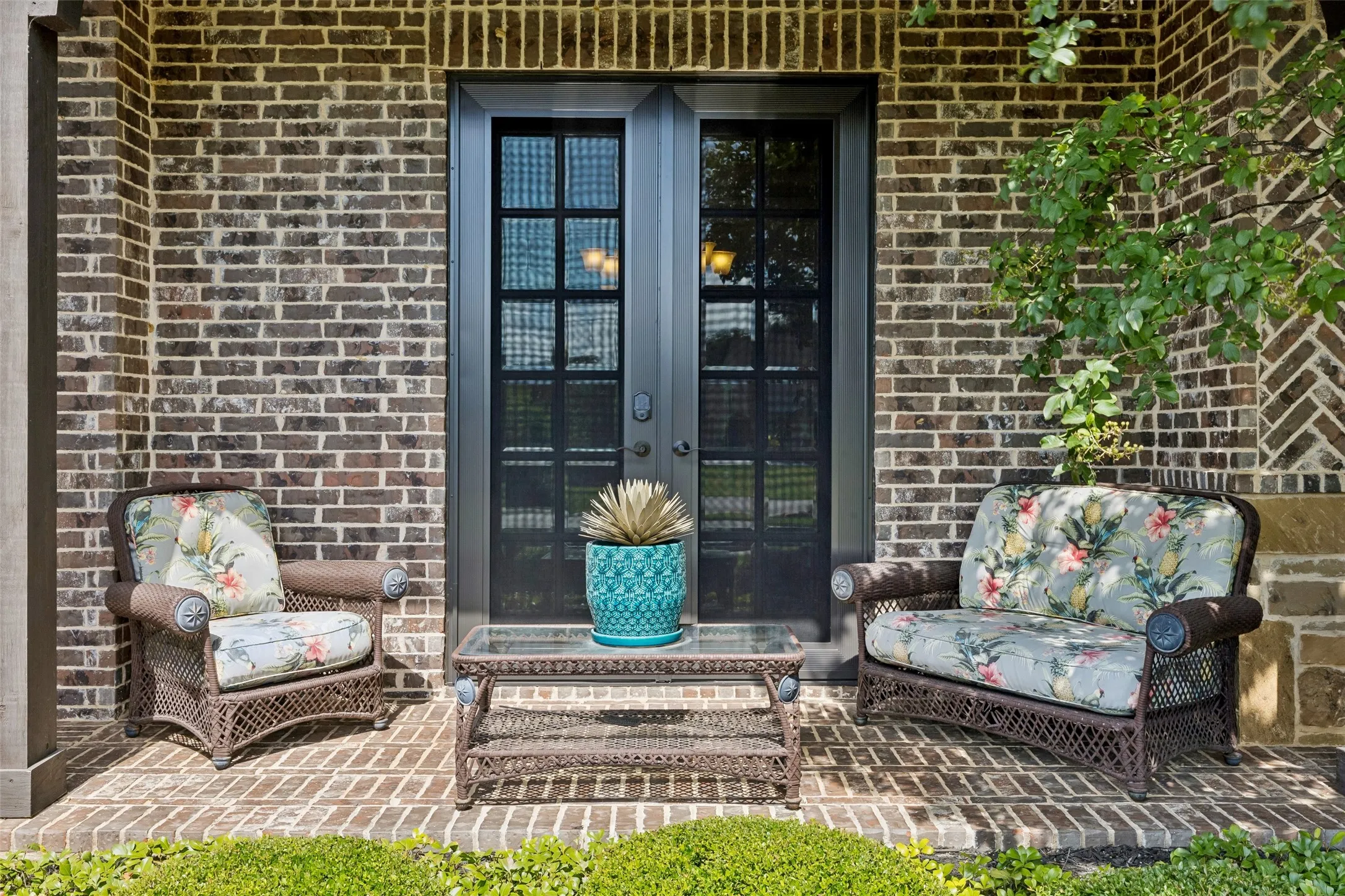 Brick exterior featuring a herringbone pattern accent