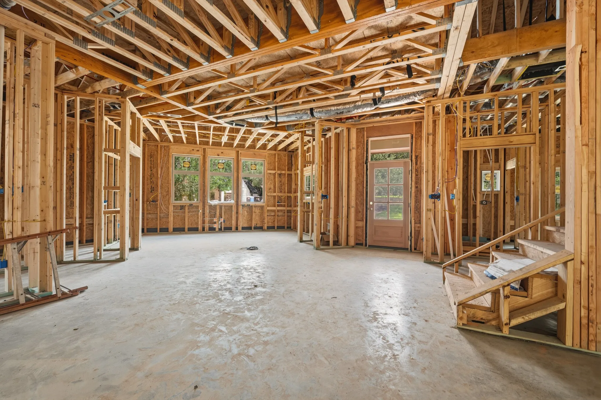 Picture taken towards entry way and offset U shaped Kitchen.