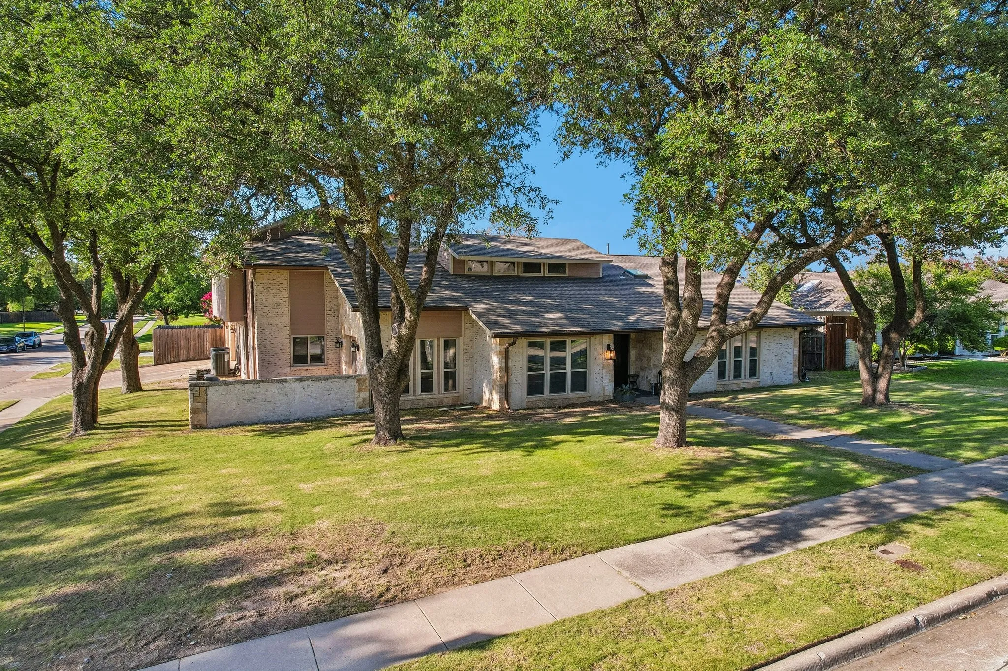Front of house with beautiful mature trees