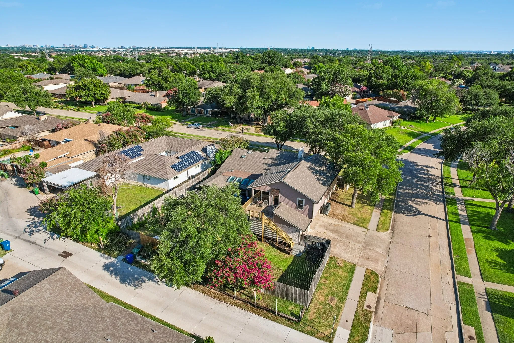 Aerial View of large corner lot with 3 car garage