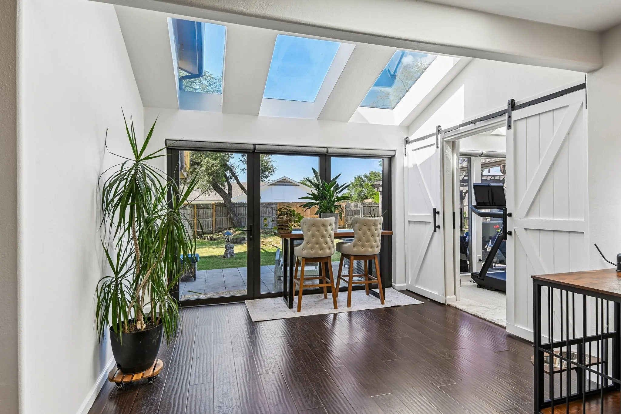 Sunroom or Solarium space that views backyard