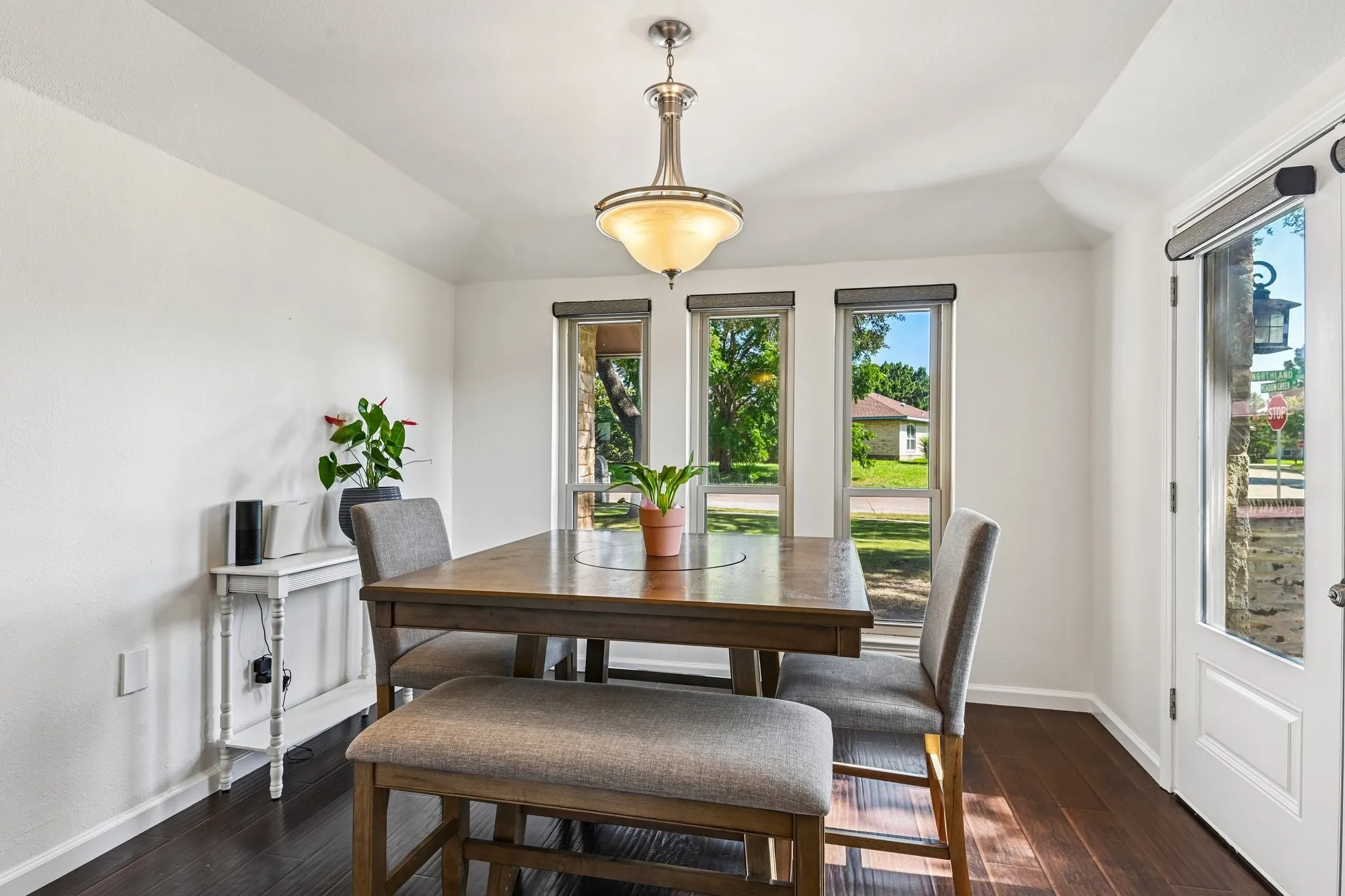 Breakfast Nook with double doors out to side patio