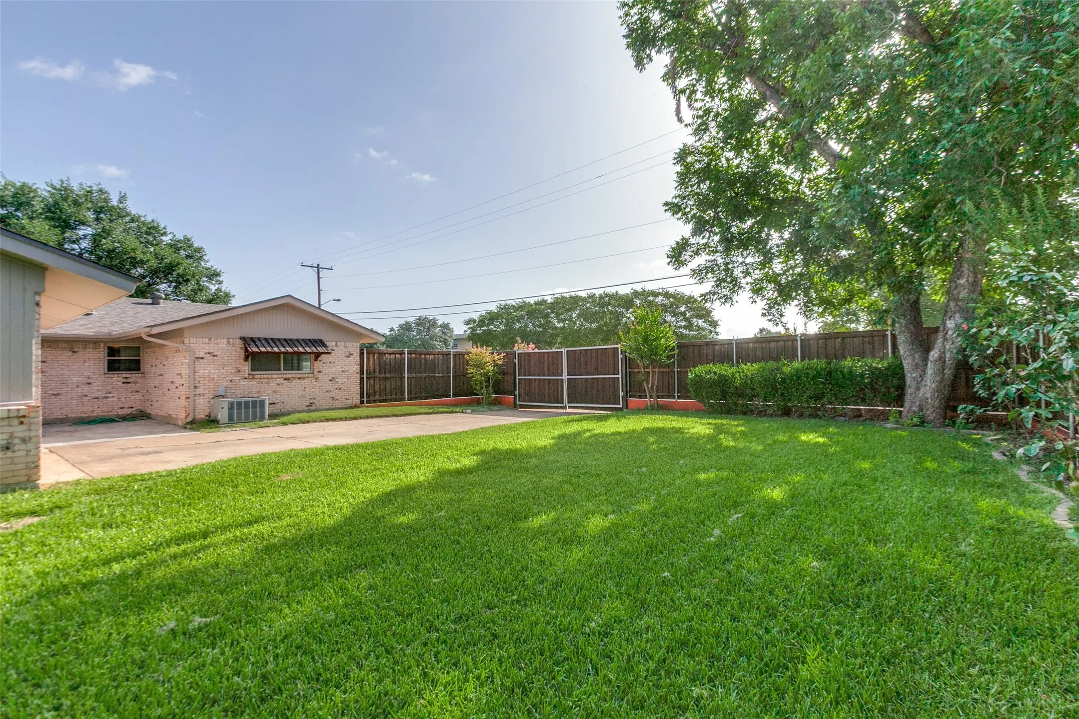 Large private grassy backyard