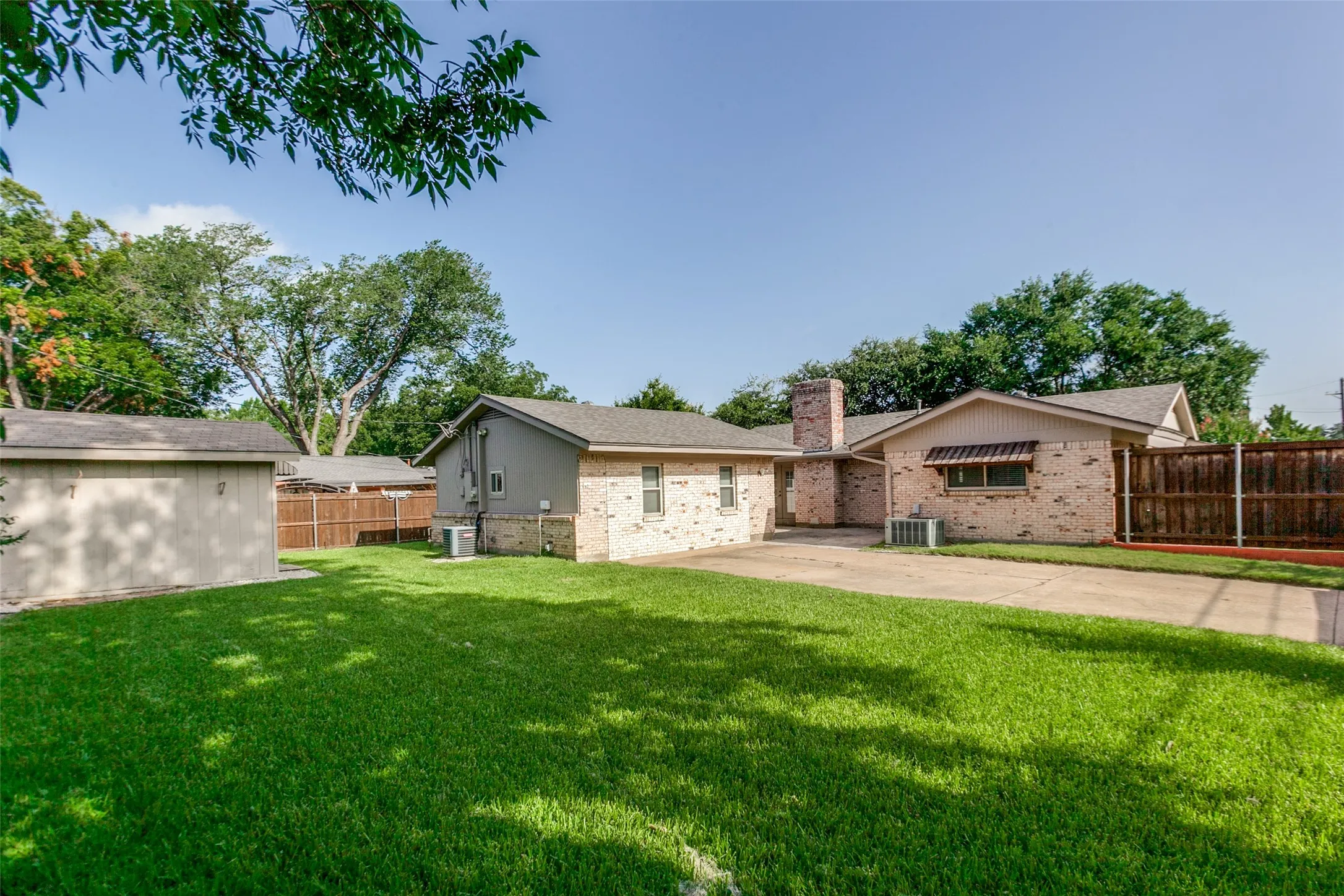 Fully fenced private backyard and shed