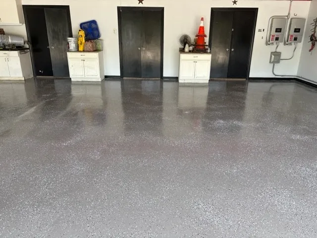 The garage and storage area floors recently had apoxy put on them.