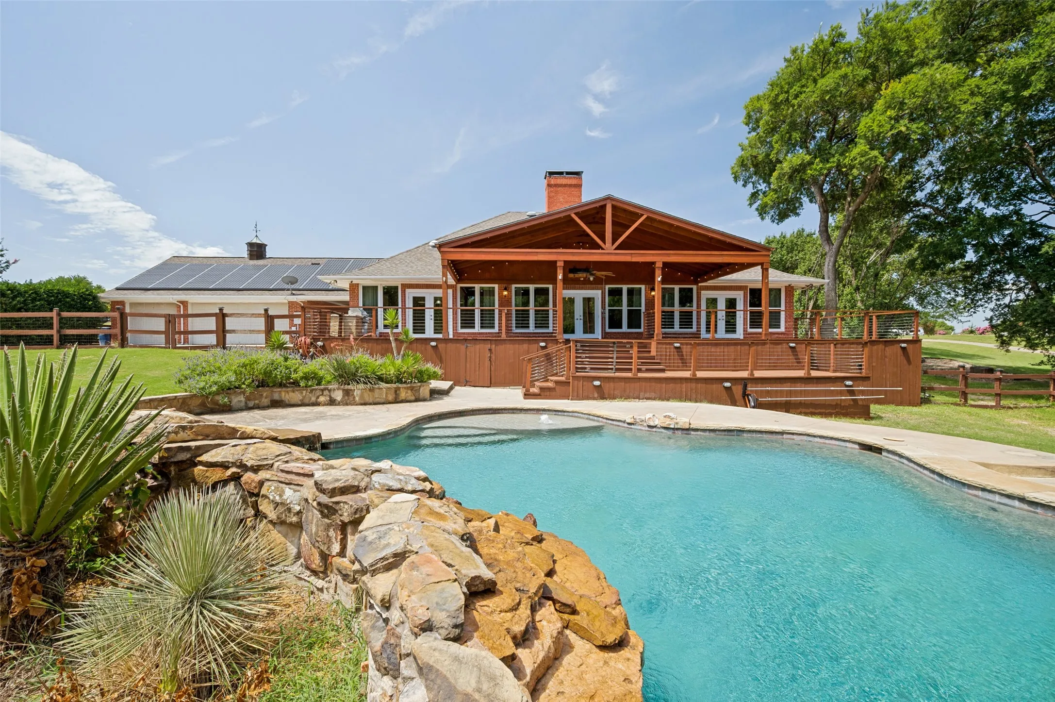 Pool and back outdoor living area.