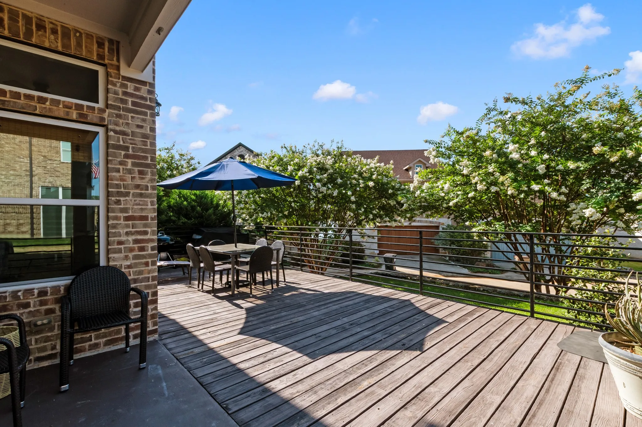Back deck with private entrance to and from infinity pool and additional nearby parking.