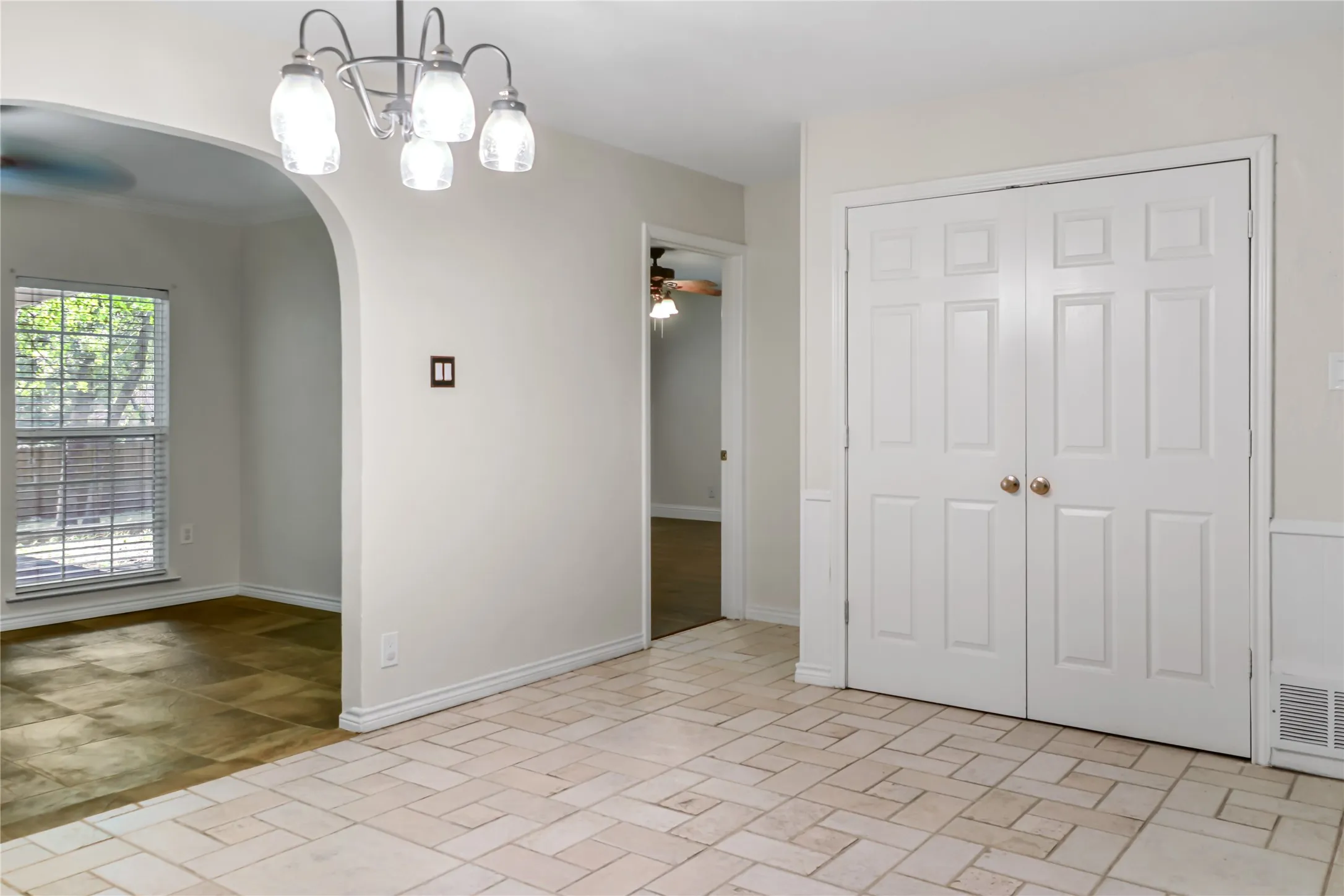 Breakfast room, looking at laundry doors