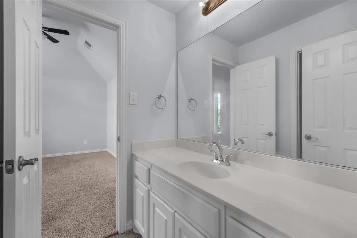 Two secondary bedrooms share a convenient Jack-and-Jill bathroom.
