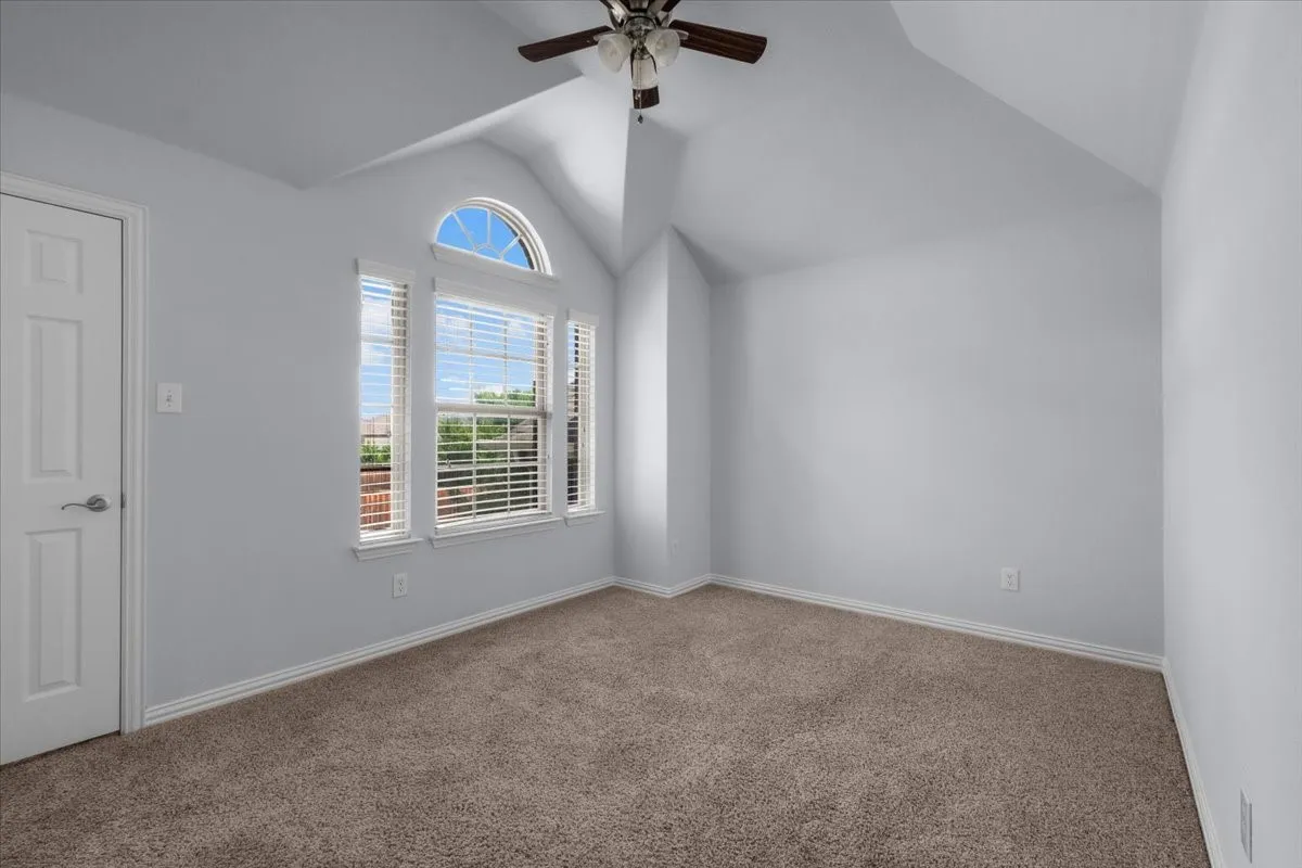 Bedroom with walk-in closet