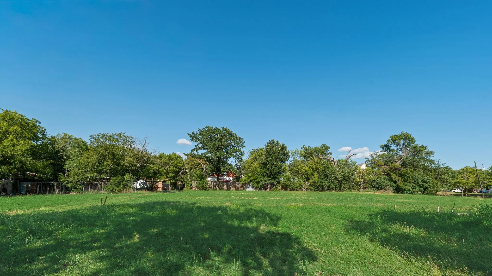 Open pasture behind this home.
