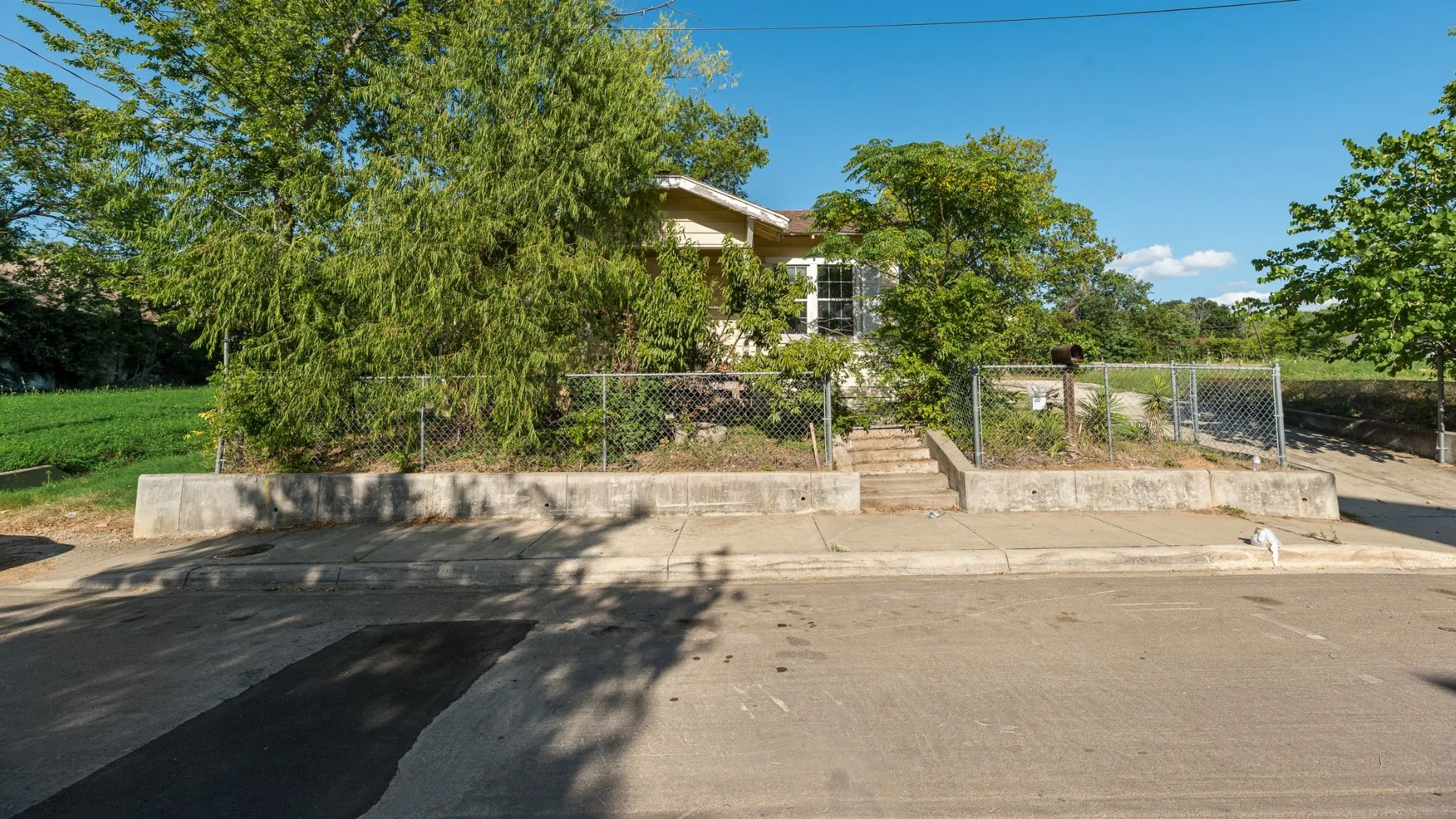 Directly the front of this 410 N Patton's SFR 840 square foot home.