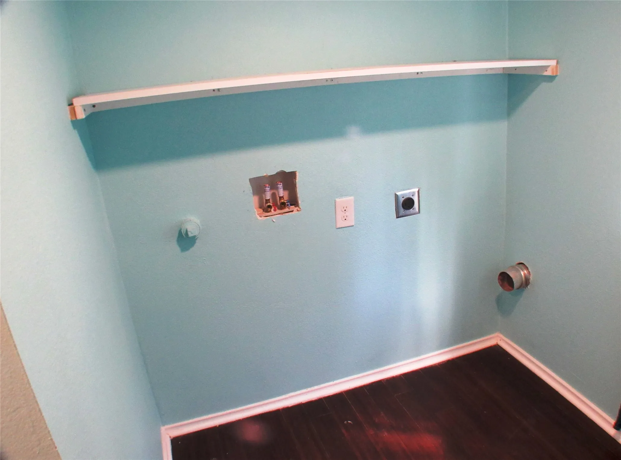 Enough room for full size washer and dryer with room or your laudry