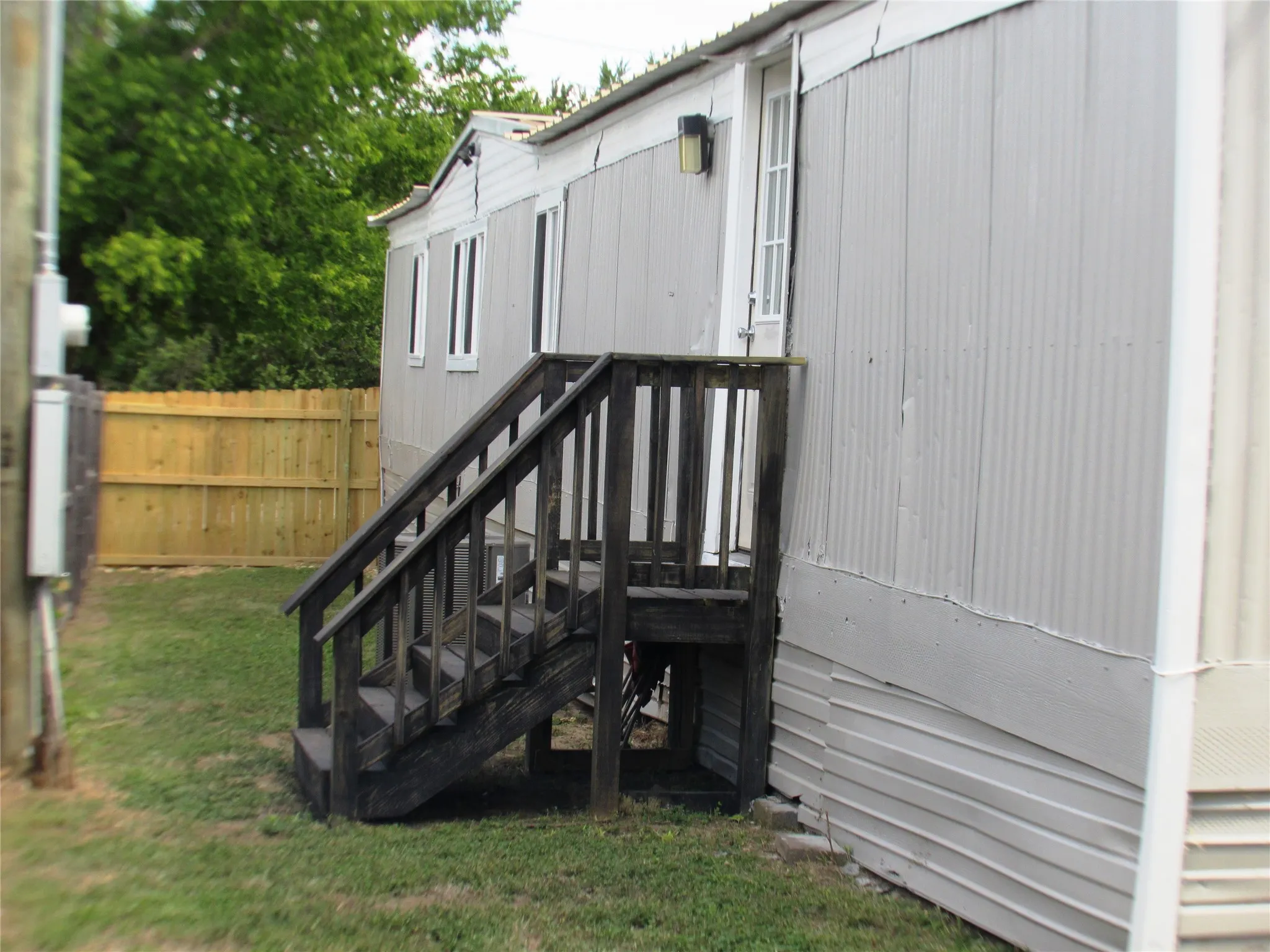 Officially the front door, but actually used as a rear entrance or exit. Private, too!