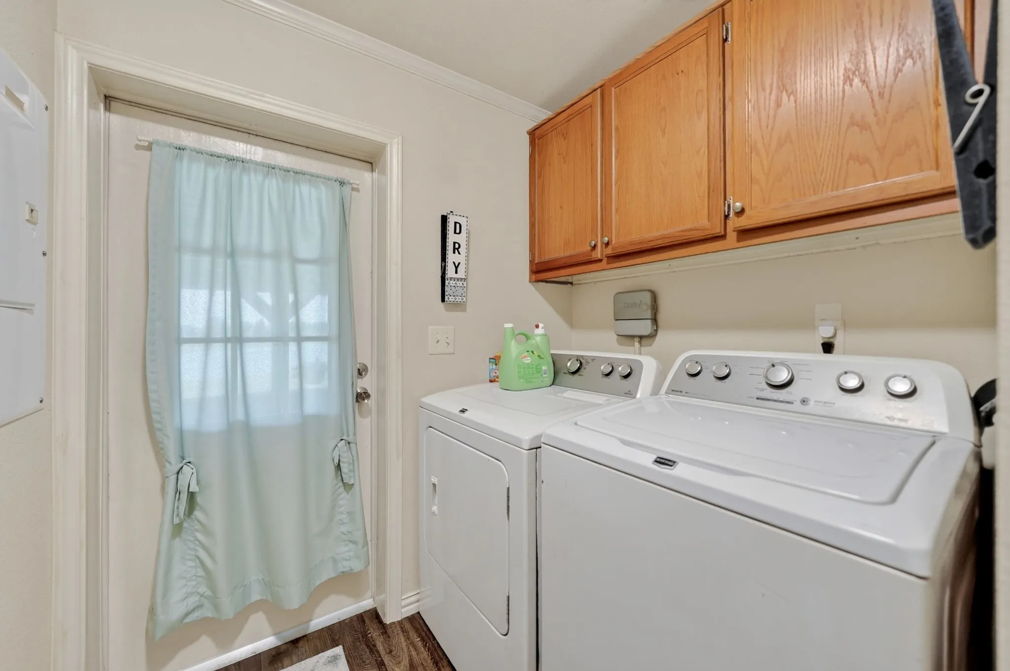 Dedicated laundry area featuring