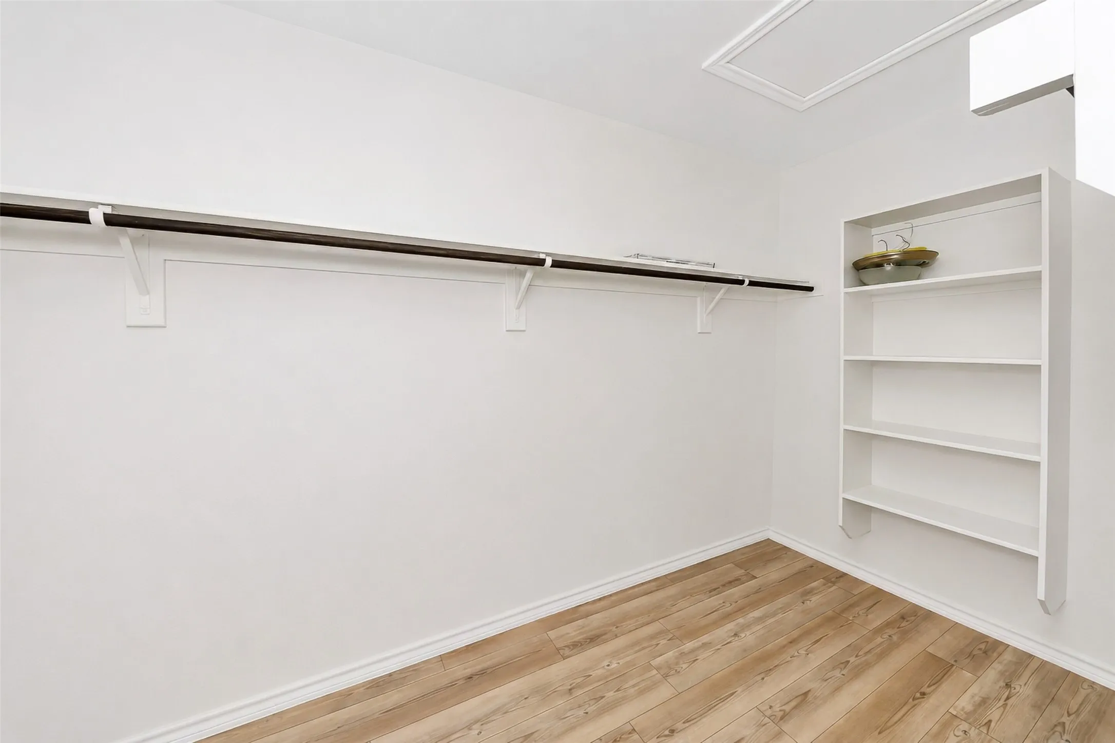 Primary Closet is 11'5" x 6'5"