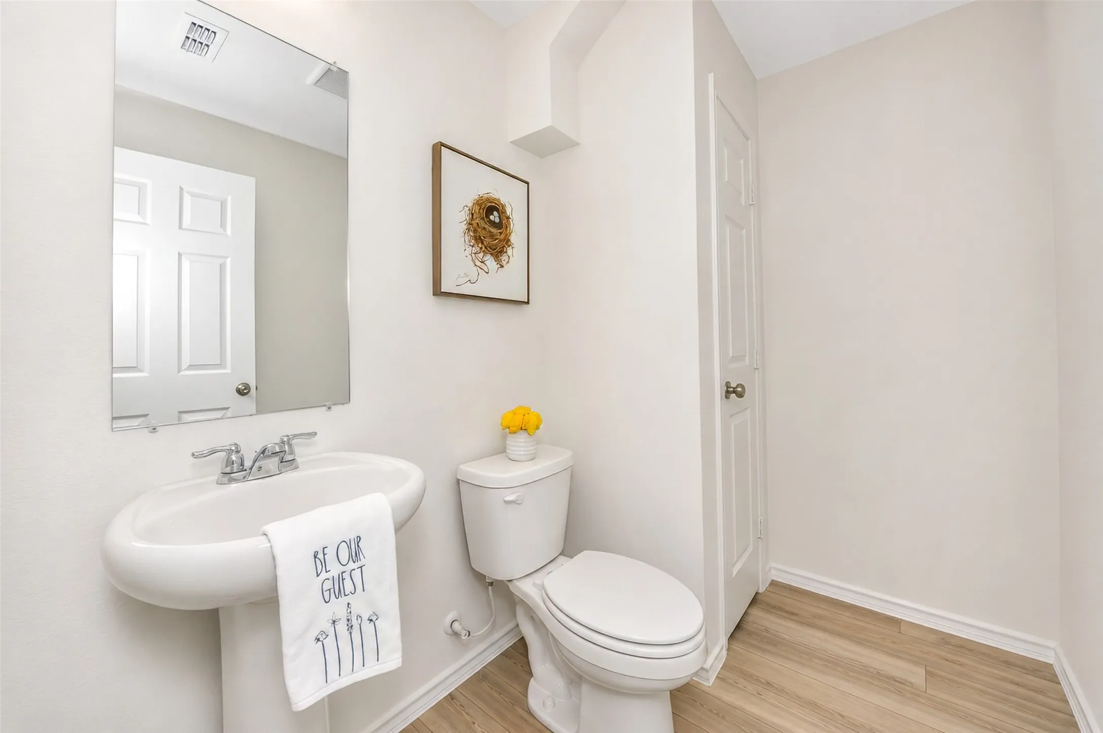 Half Bath Downstairs is 7'4" x 5'8"