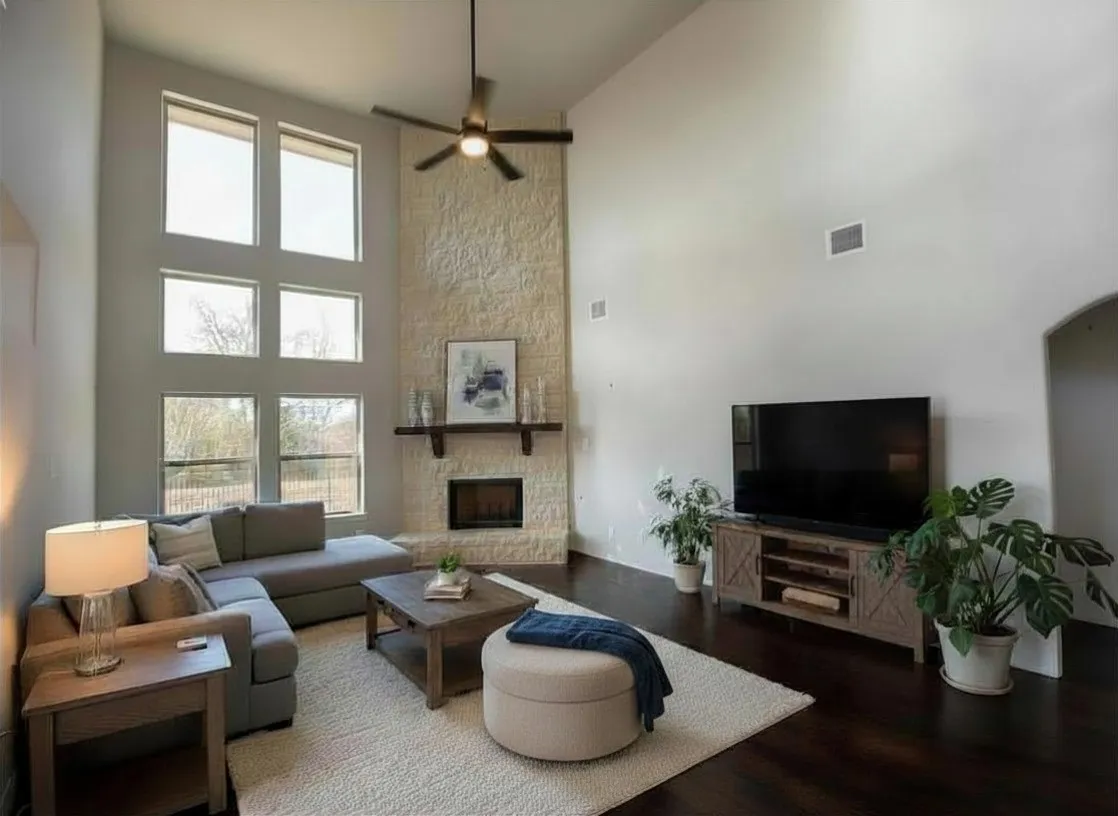 Wall of windows in impressive family room
