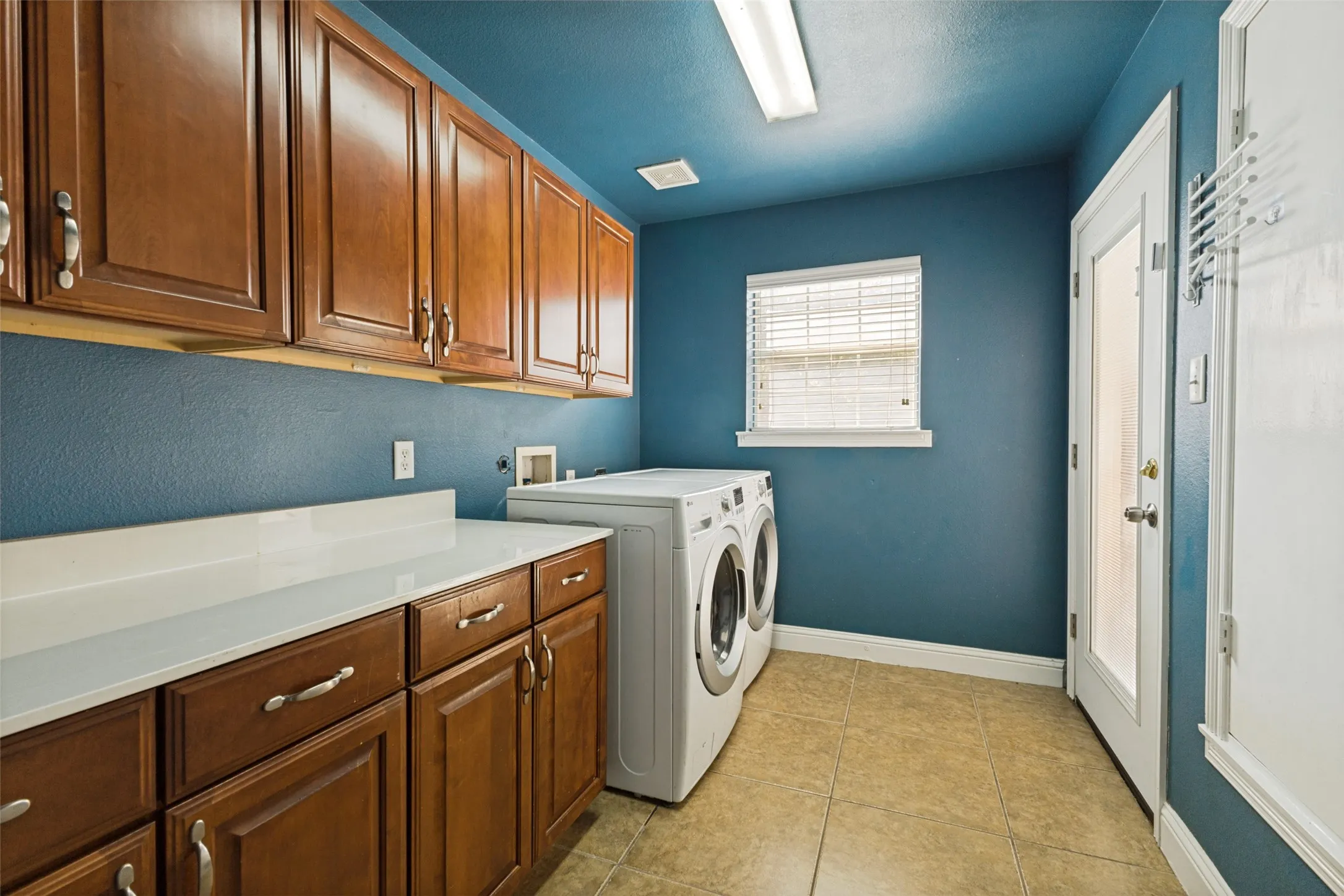 A door in the laundry room leads outside