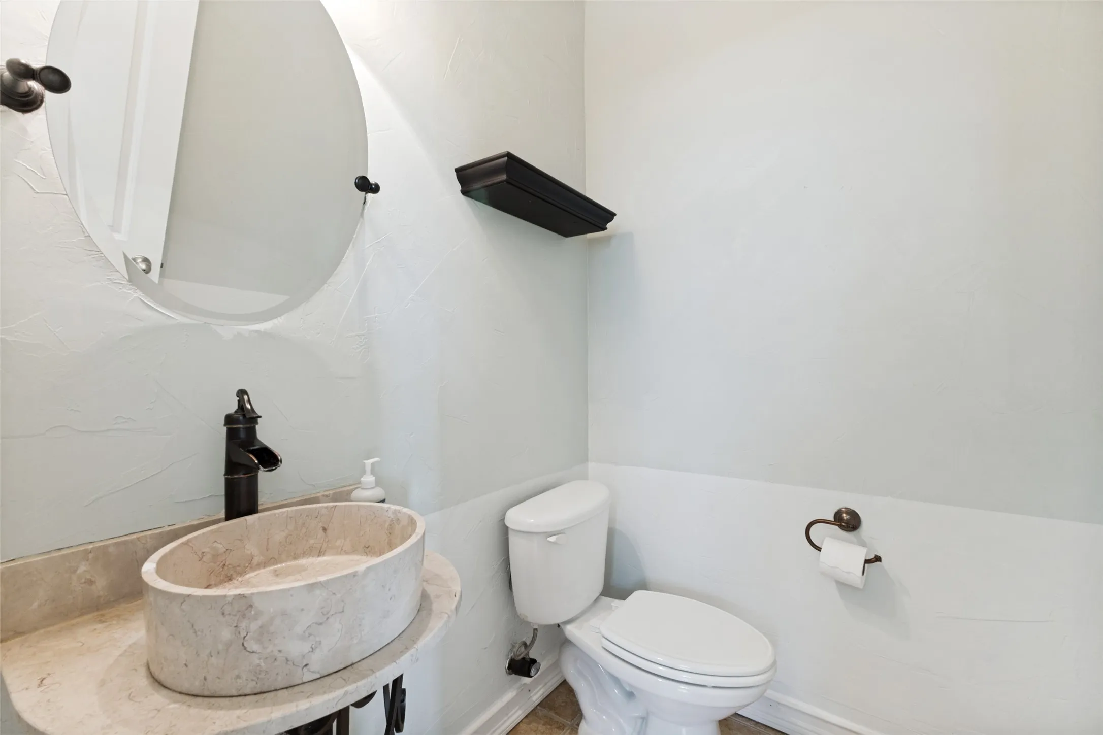 Half bathroom is just off of the kitchen