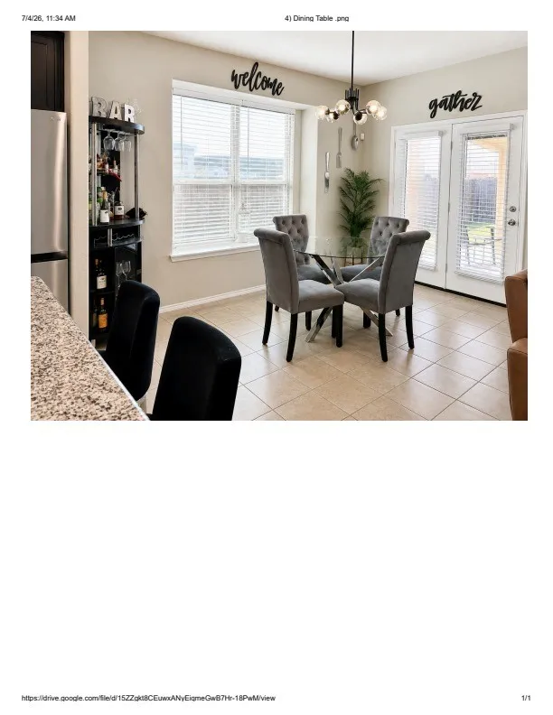 Dining area featuring a modern chandelier, tile flooring, and direct access to an outdoor space via double doors
