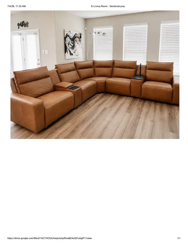 Living room featuring wood-finish flooring, light-toned walls, and multiple windows with horizontal blinds