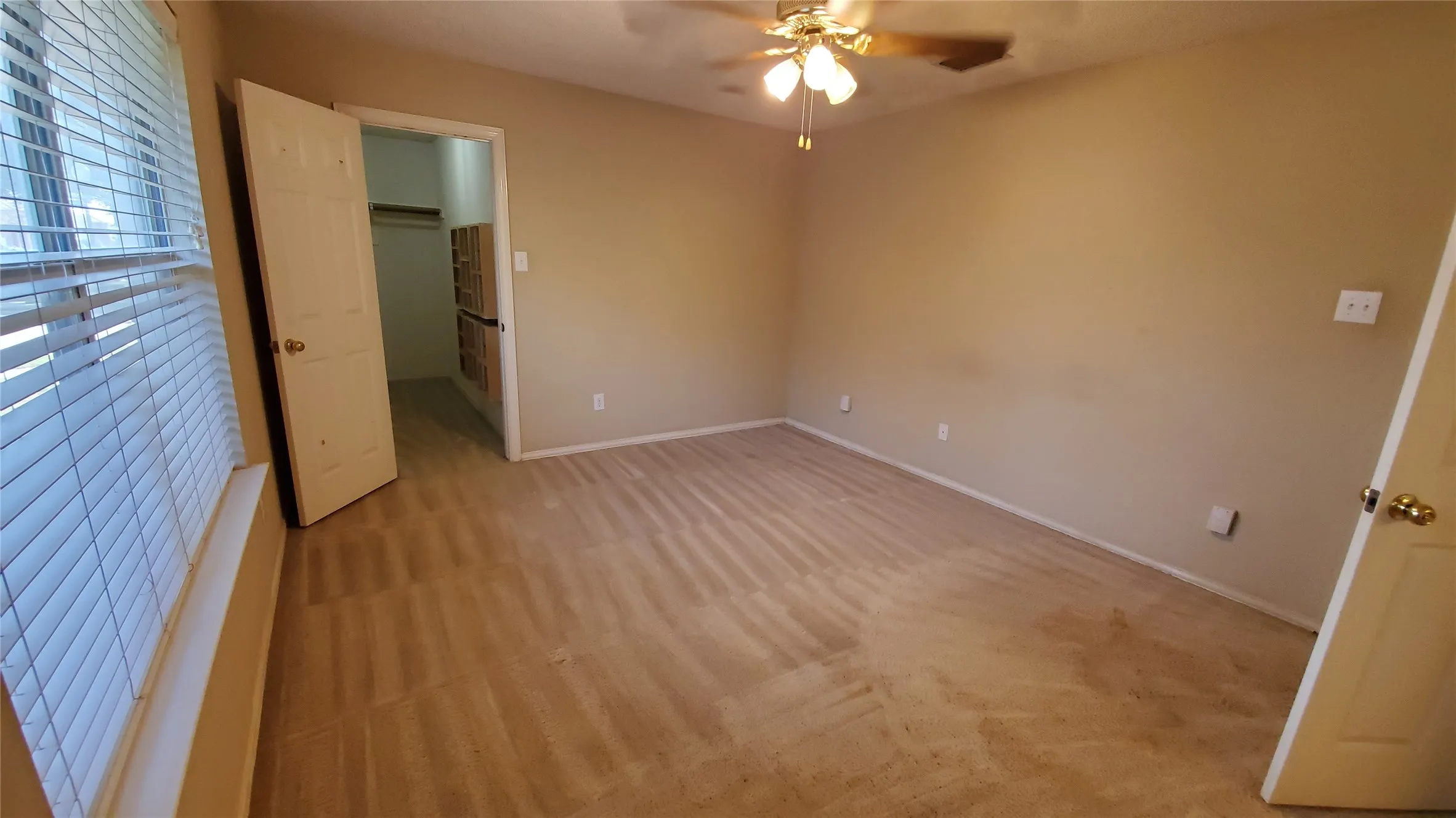 Primary bedroom with walk in closet