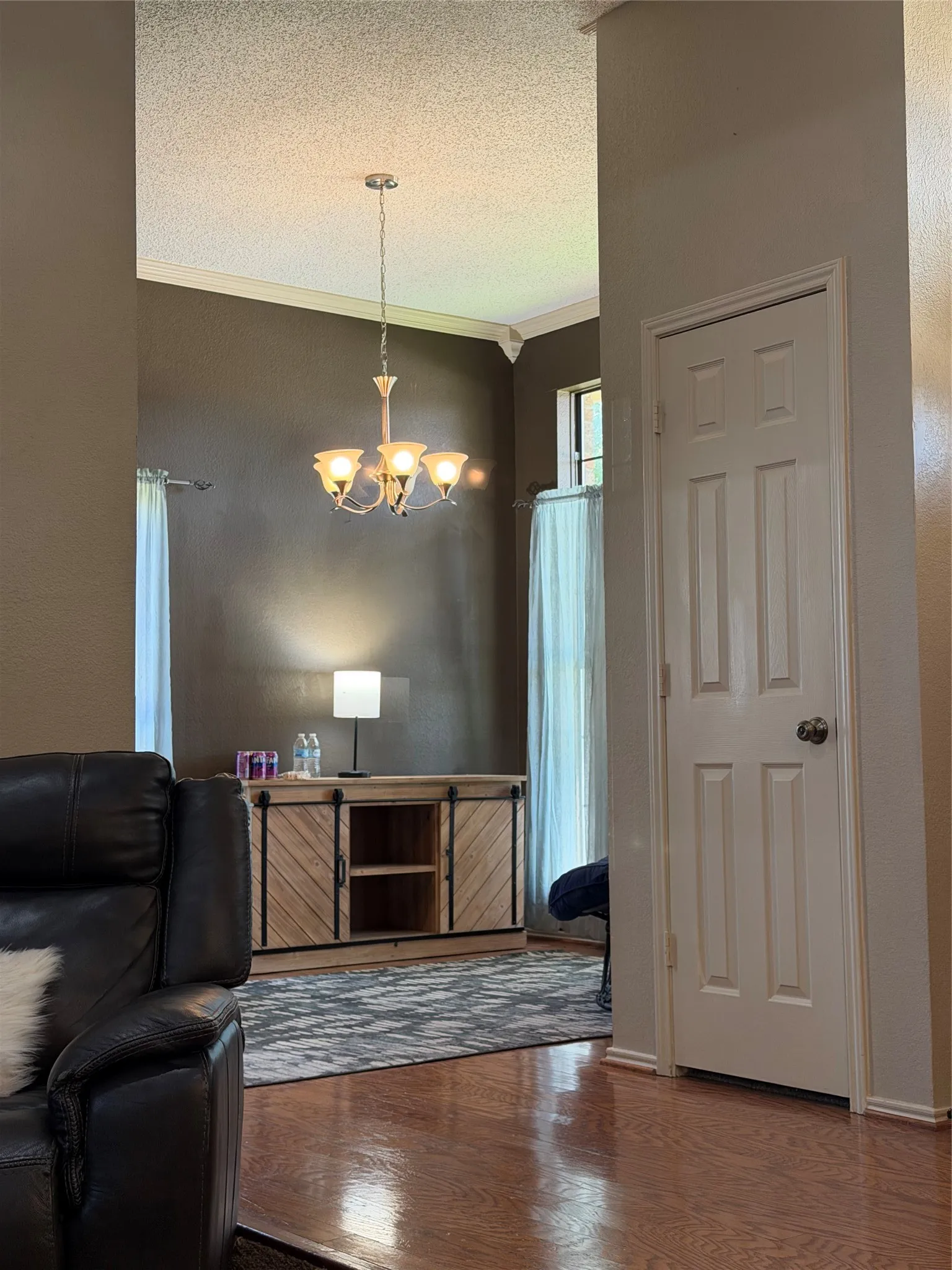 Eye view to the formal dining room that is currently being used as a study room!
