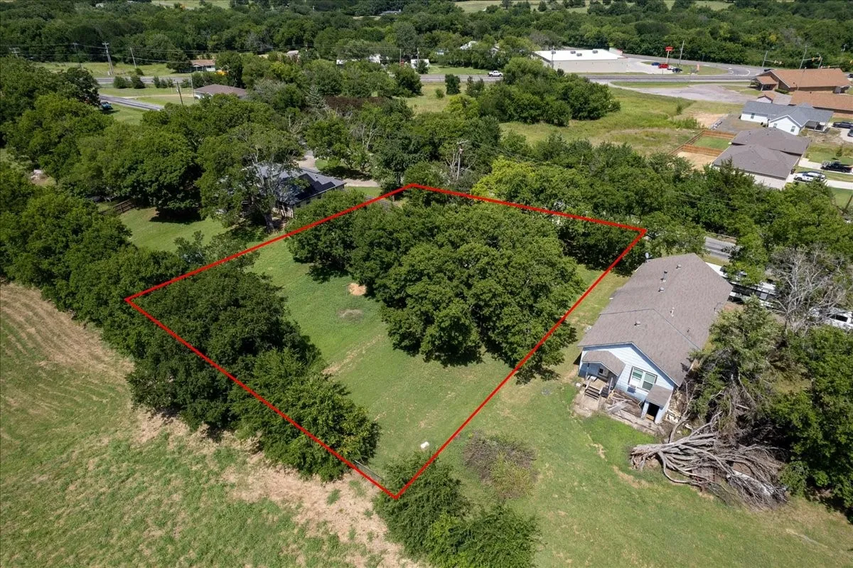 lot with existing structure and mature trees