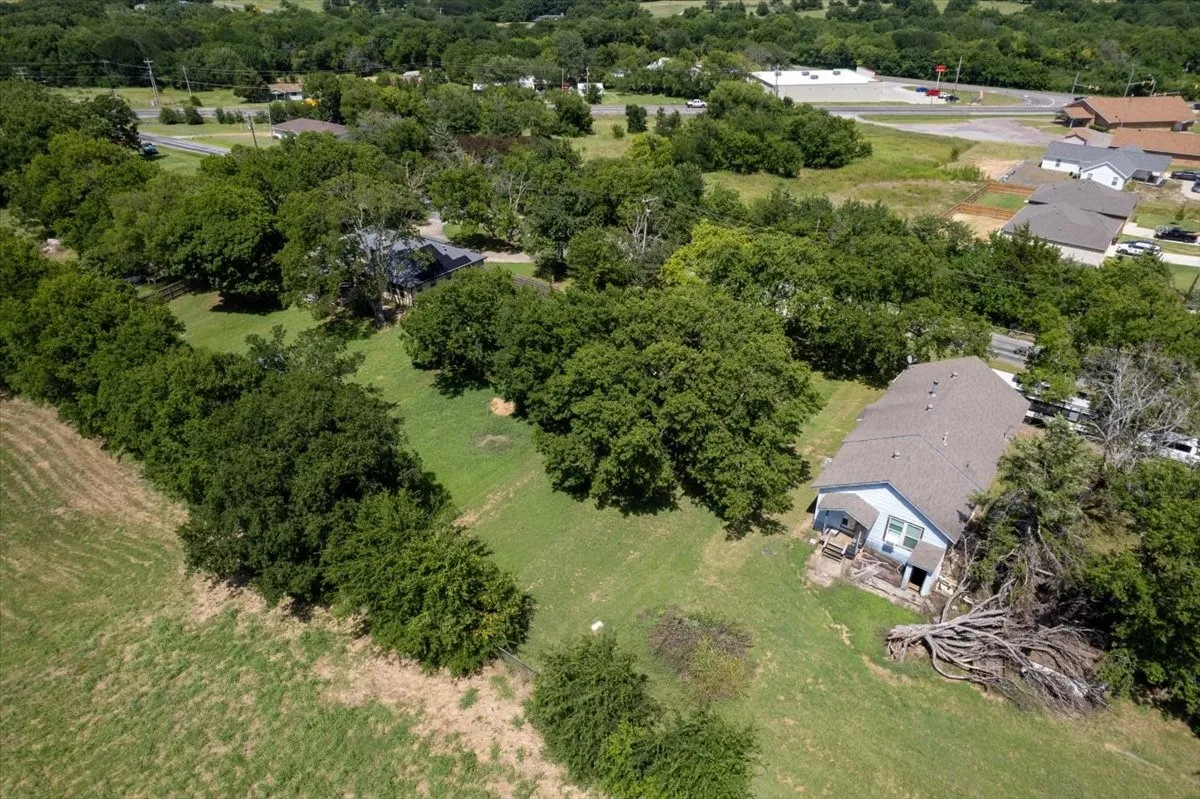 lot with wooded surroundings