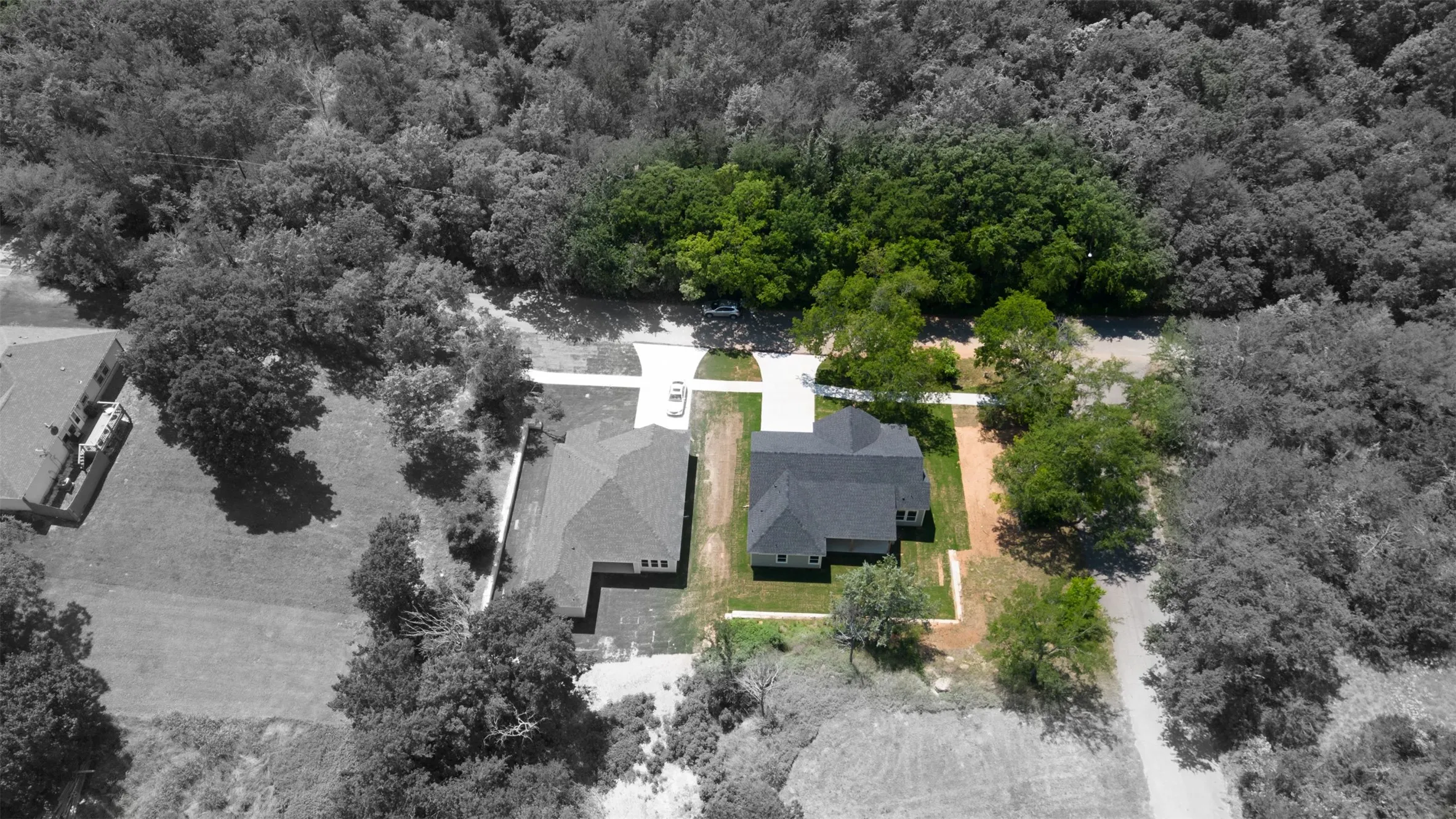 Newly constructed single-story residence with an asphalt shingle roof