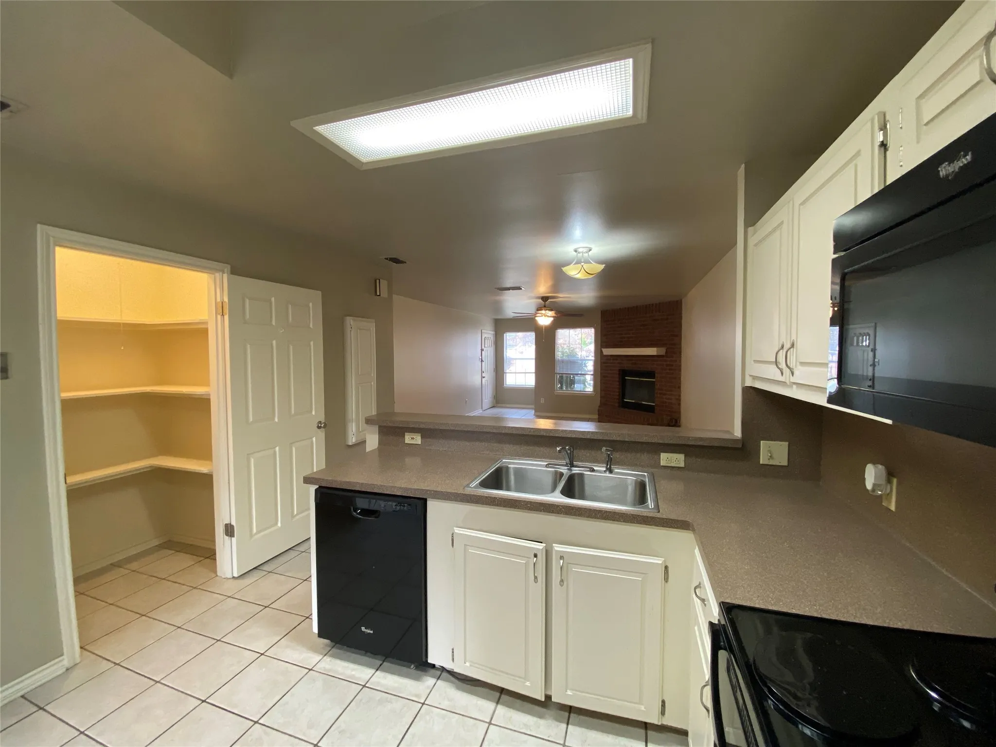 KITCHEN VIEW OF WALK IN PANTRY