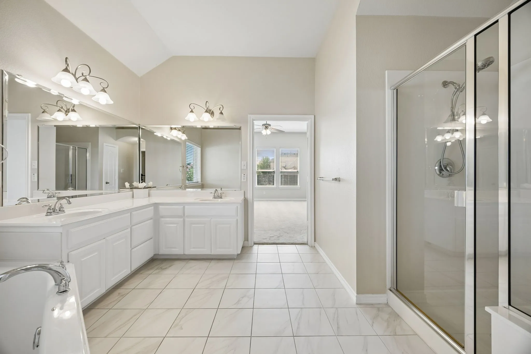 Tons of natural light from window over tub.