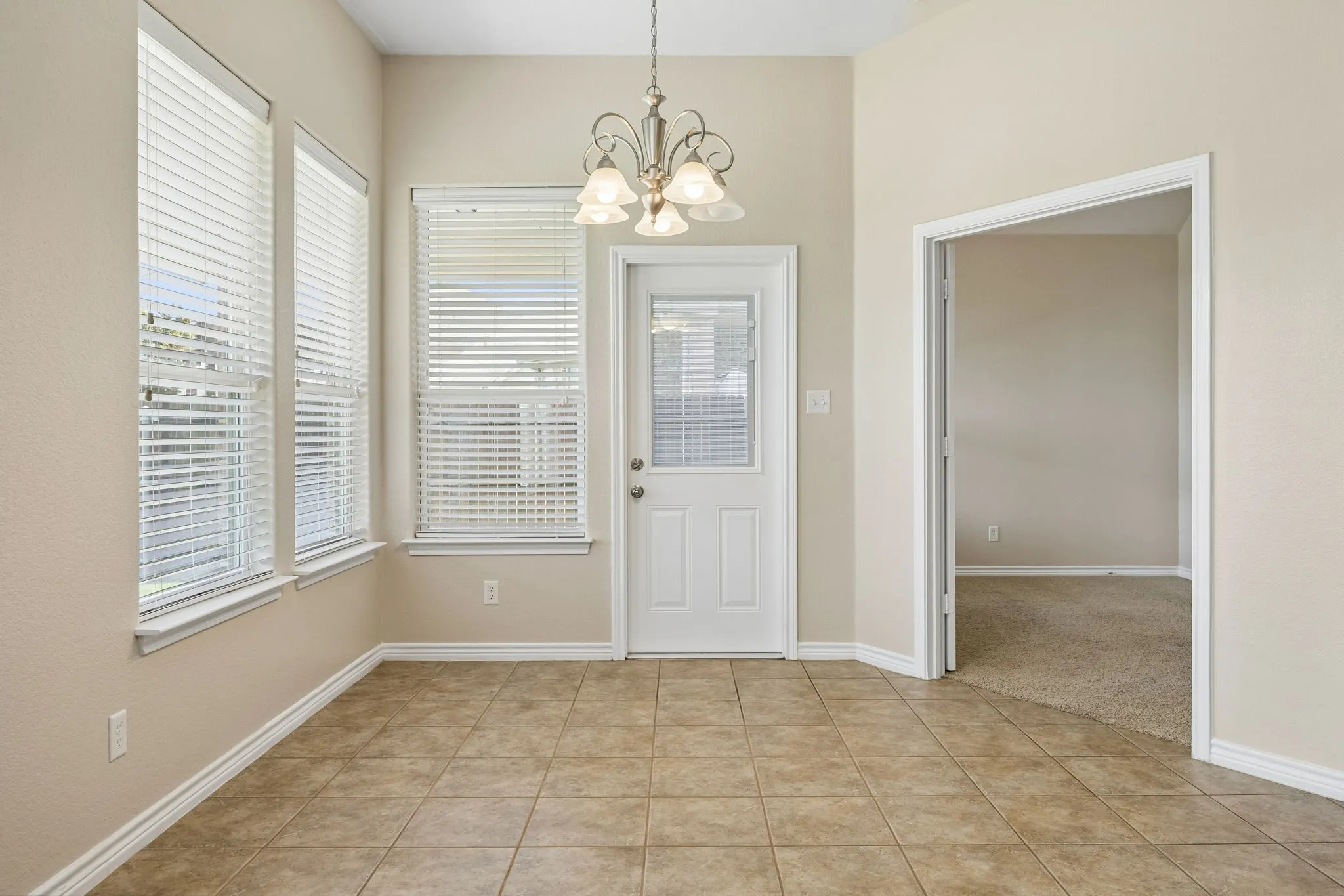 Breakfast nook by 4th bdrm or a study with french doors.