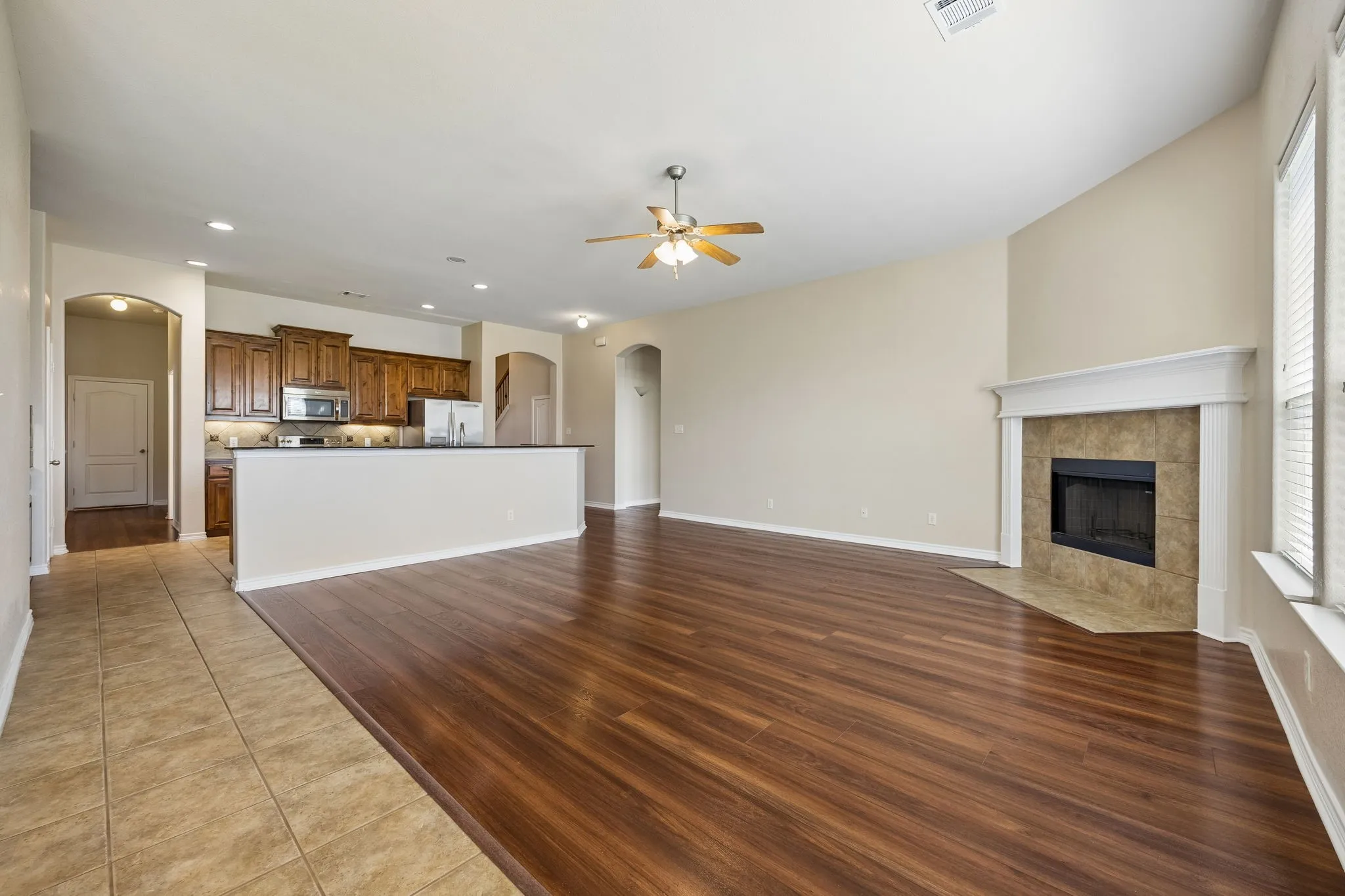 Another view of kitchen with breakfast room behind