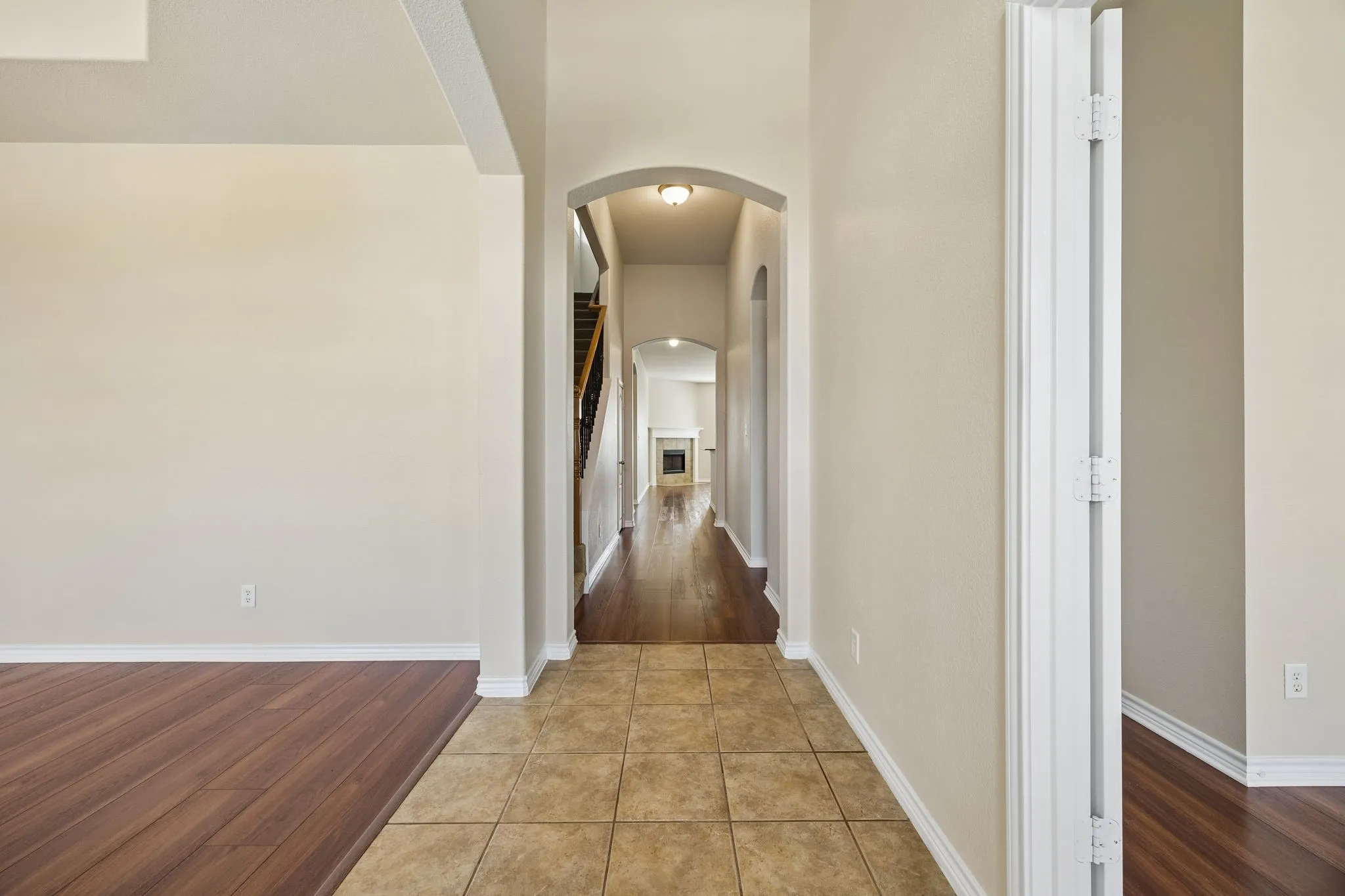 Foyer entrance with high ceilings and designer light fixtures!