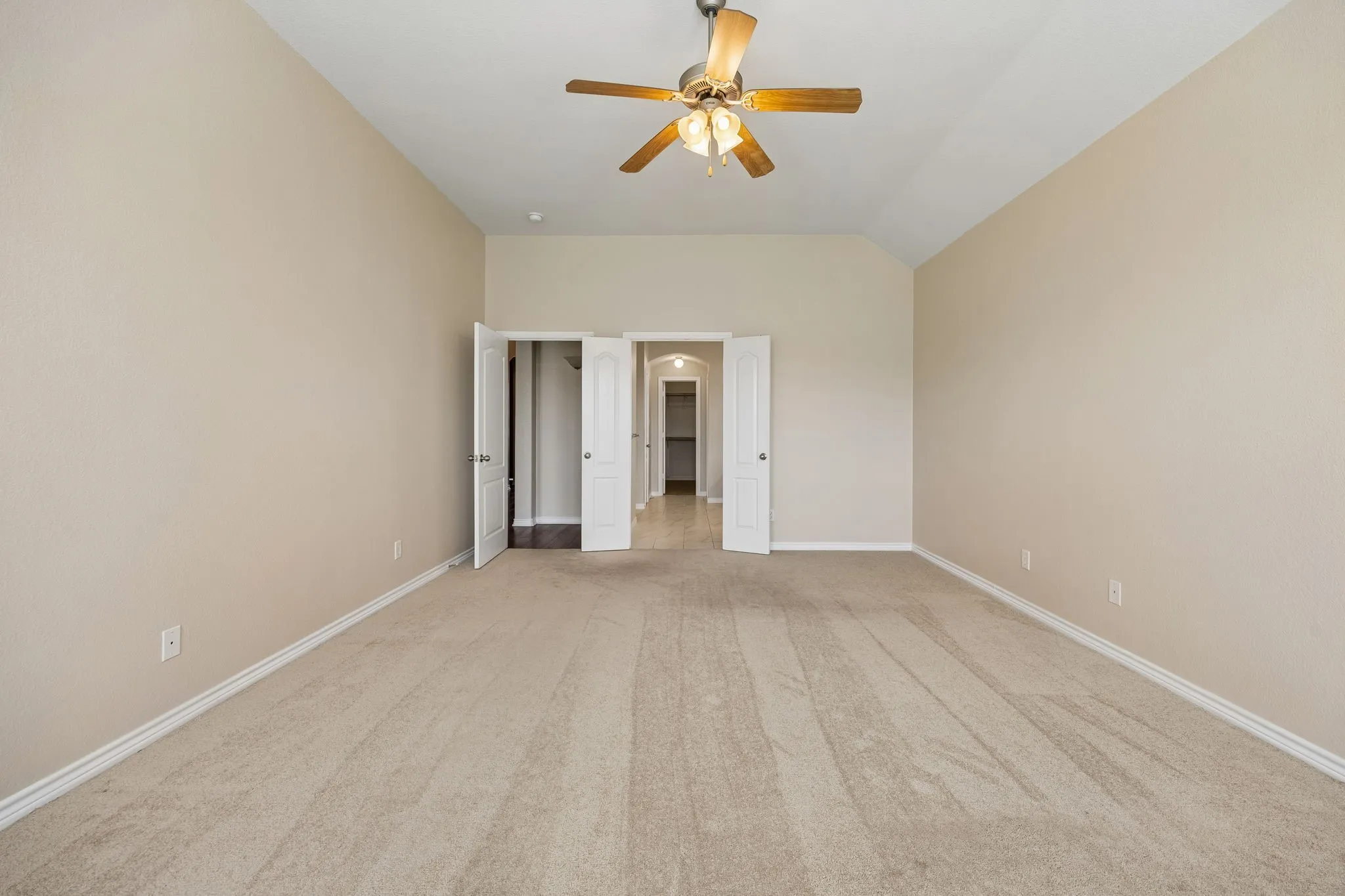 Another view of large primary bedroom.