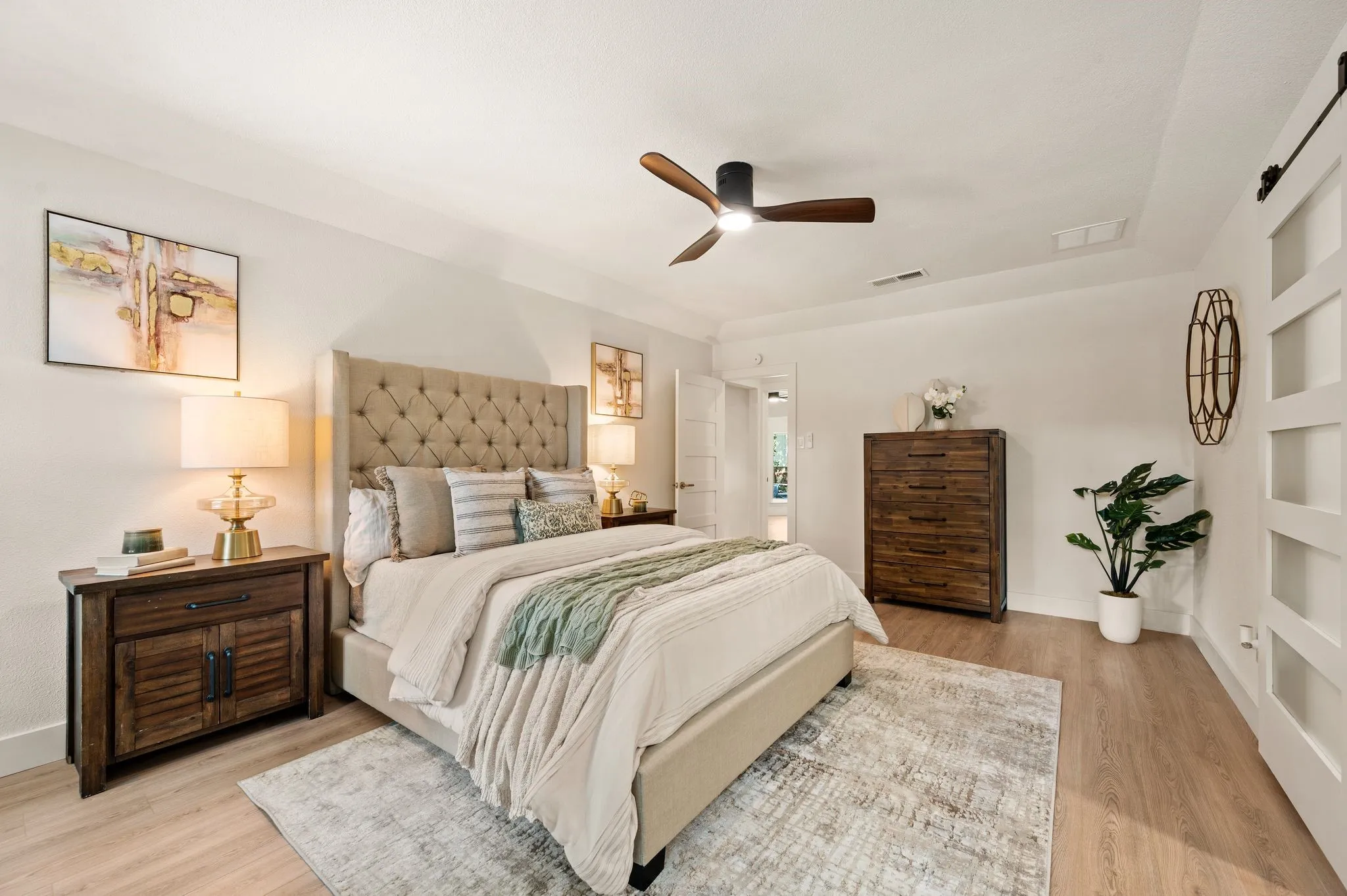 The primary suite offers ample room to retreat, recharge, and make the space entirely your own.
