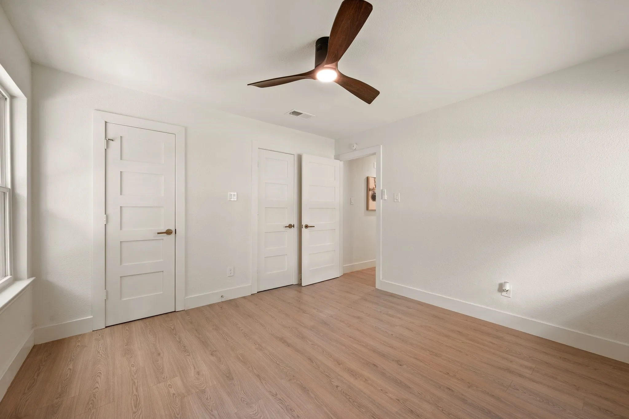 Generous wall space and a flexible layout make this bedroom easy to adapt as needs change.
