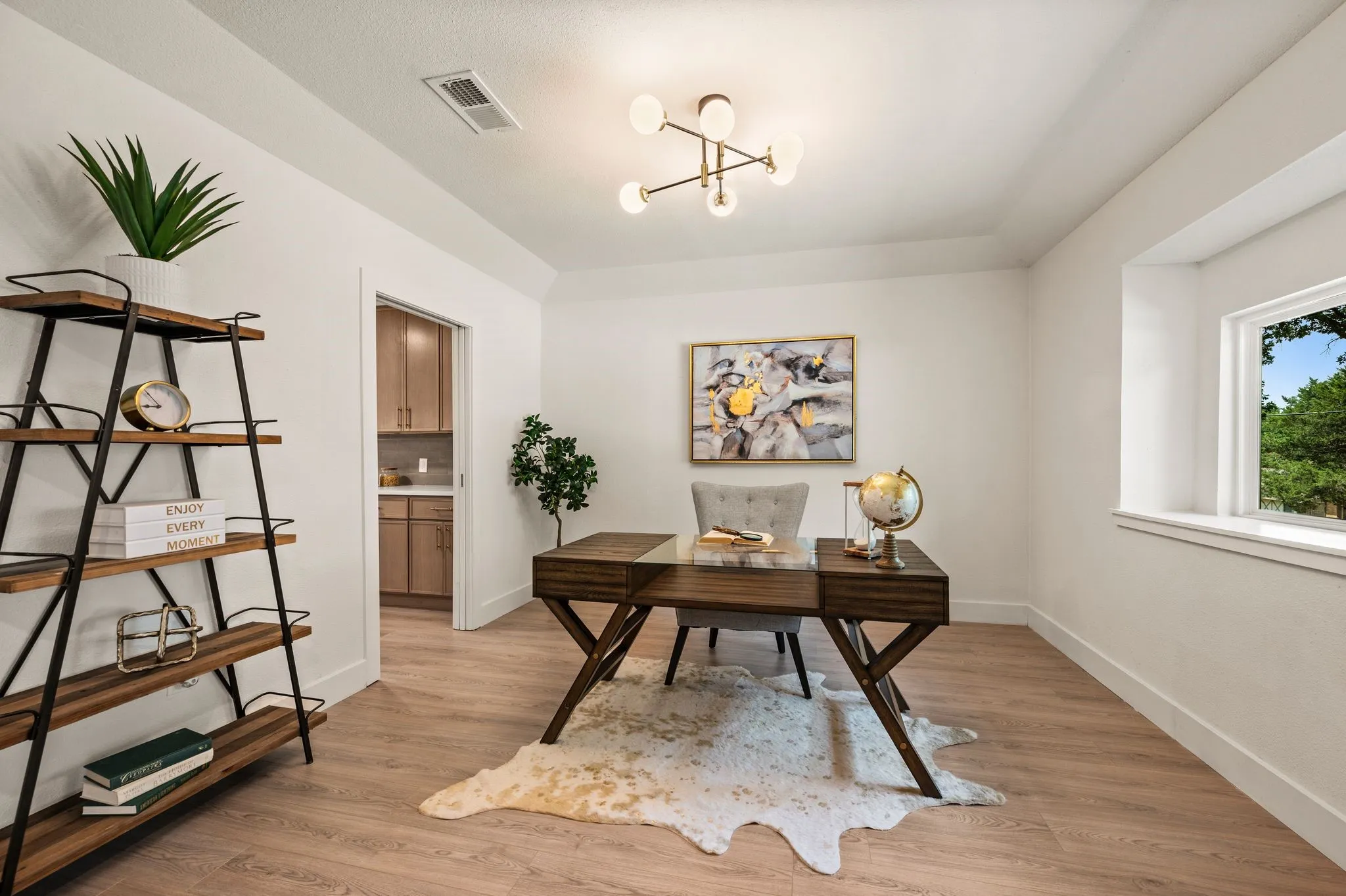 A dedicated office filled with natural light creates an inspiring place to work, study, or build what comes next.