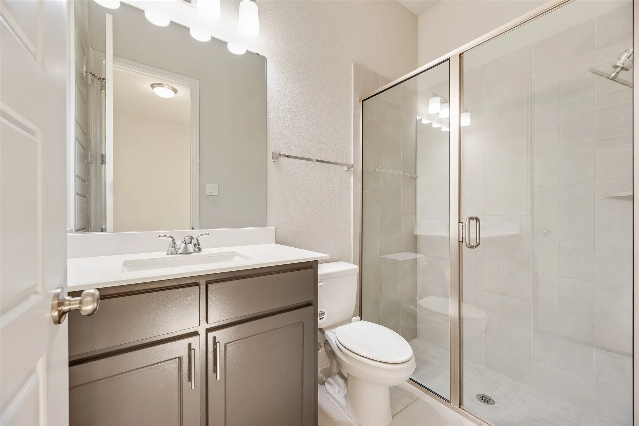 Secondary bedroom with large shower